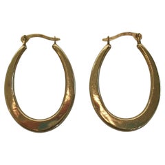 Vintage Pair of 14K Yellow Gold Elongated Hoop Earrings - U.S.A. - Circa 1980's
