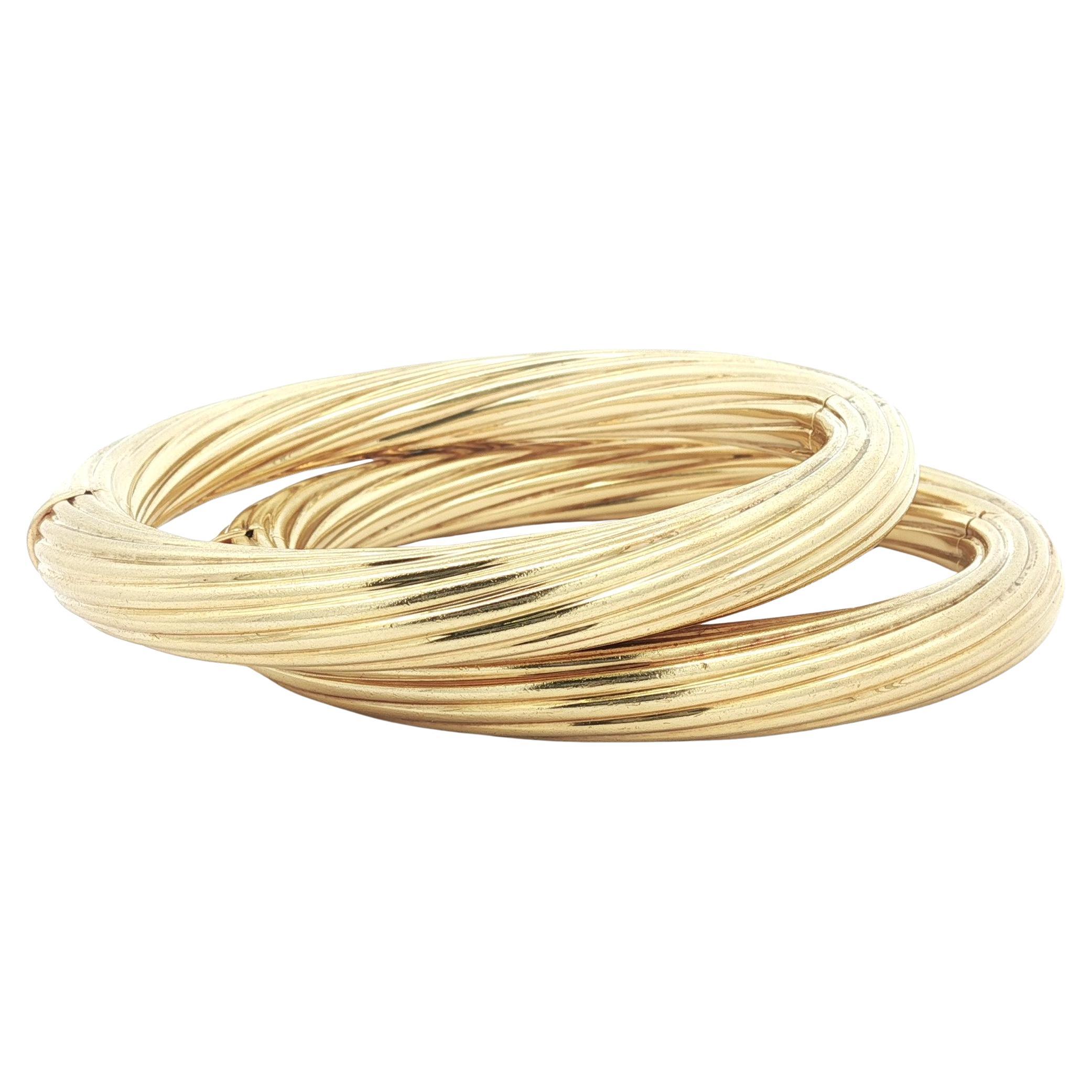 Paire de bracelets à charnière en or jaune 18k avec câble torsadé en vente