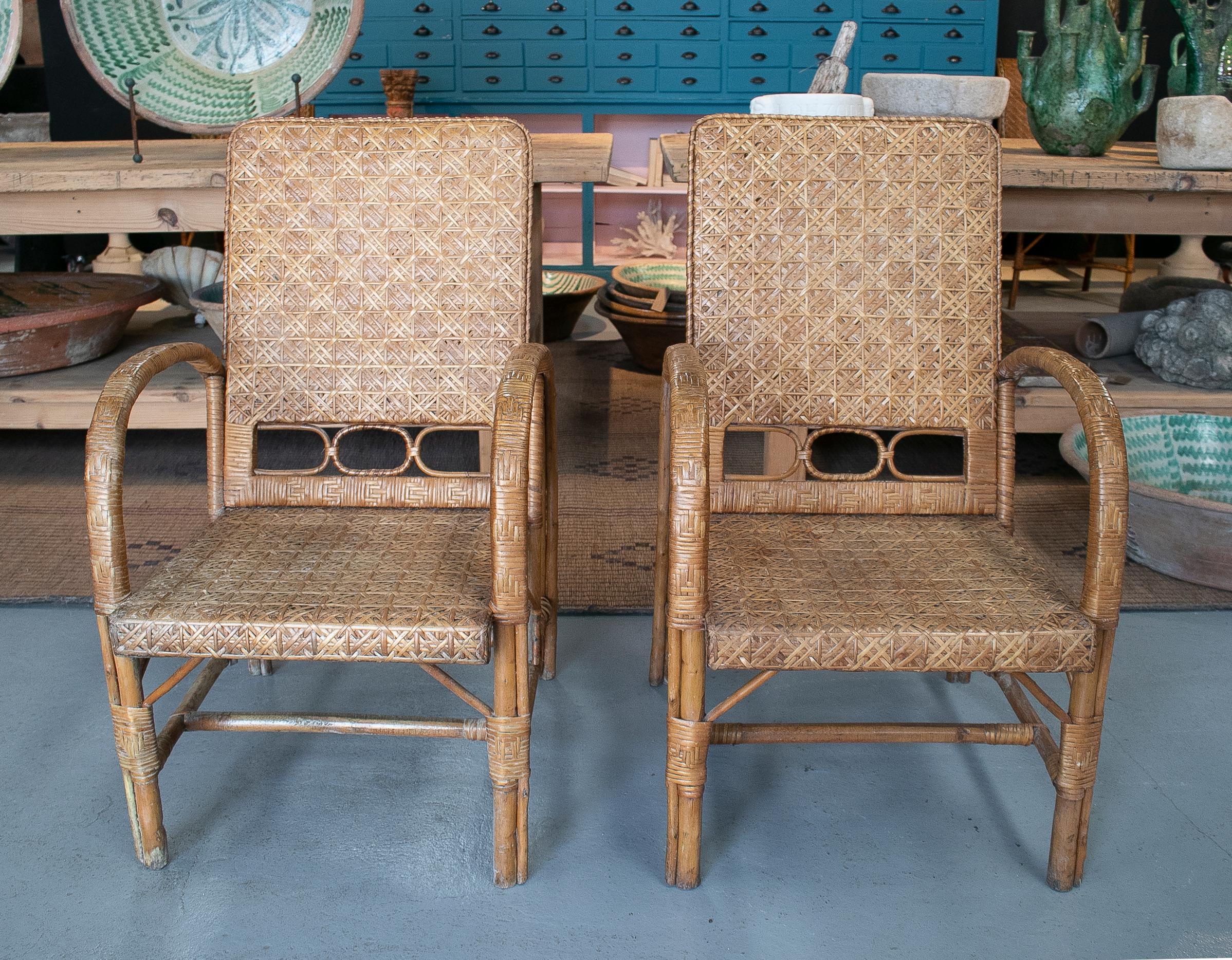 20th Century Vintage Pair of 1950s Spanish Hand Woven Wicker on Wood Armchairs For Sale