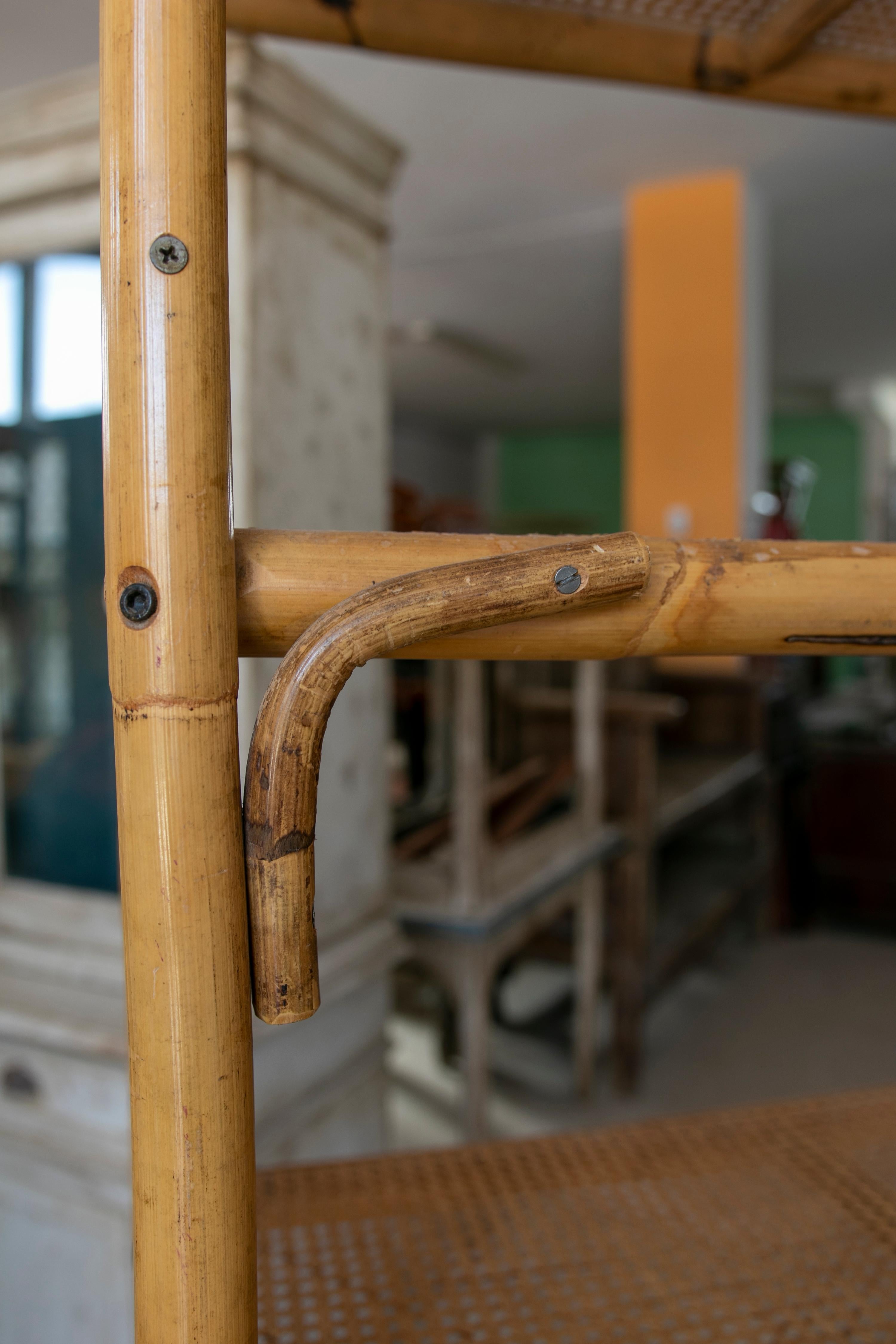 Vintage Pair of 1970s Spanish Bamboo Six Shelf Racks w/ Woven Cane