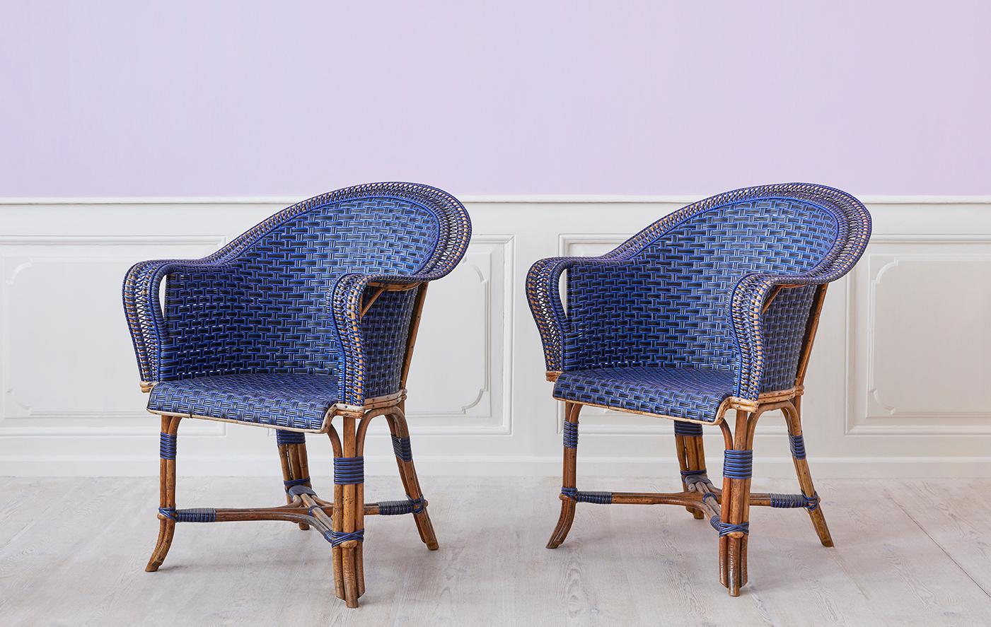 France, début du 20e siècle

Paire de fauteuils en rotin bleu et noir. 

H 89 x L 71 x P 89 cm