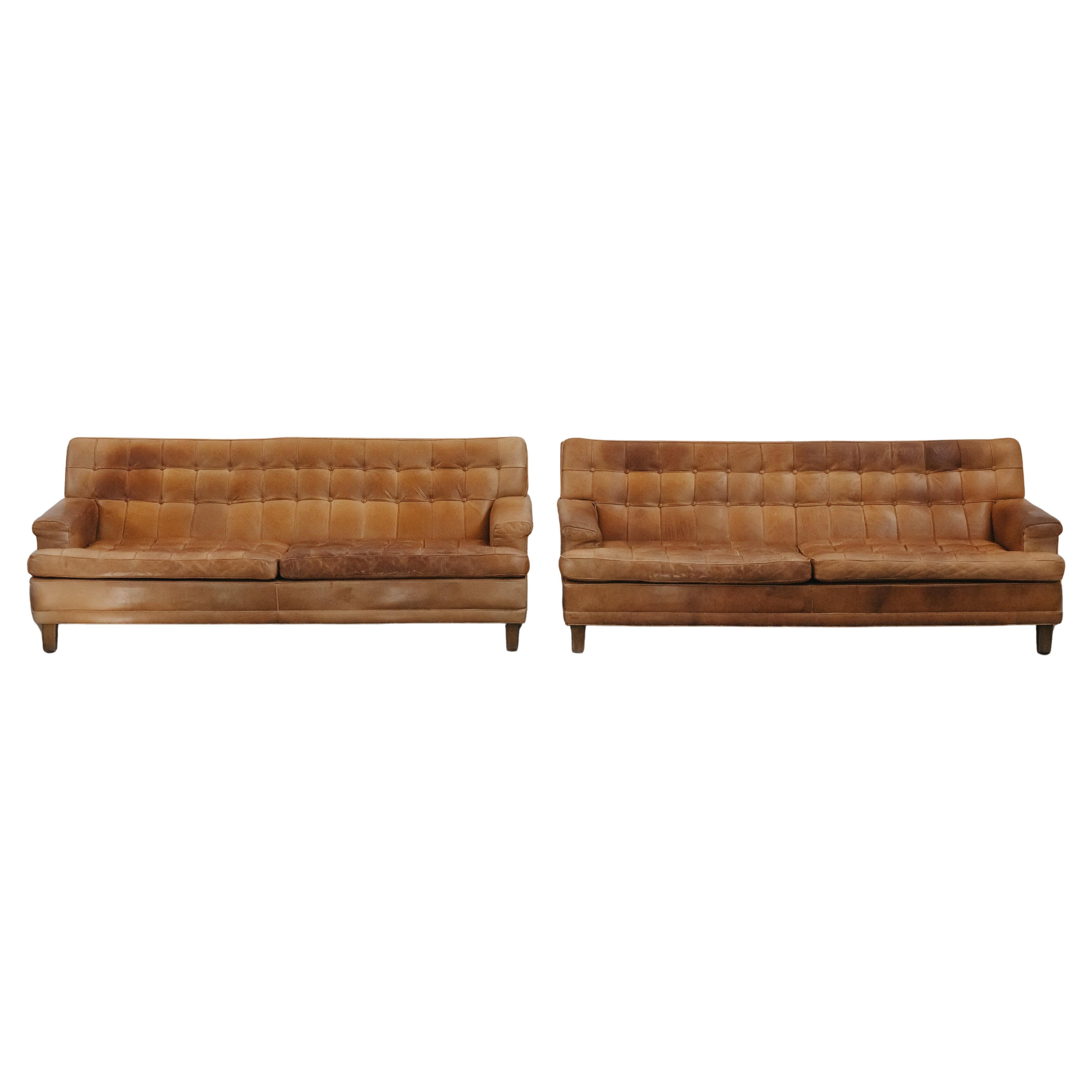 Pareja vintage de sofás Merkur de cuero de Arne Norell, Suecia, circa 1970 en venta