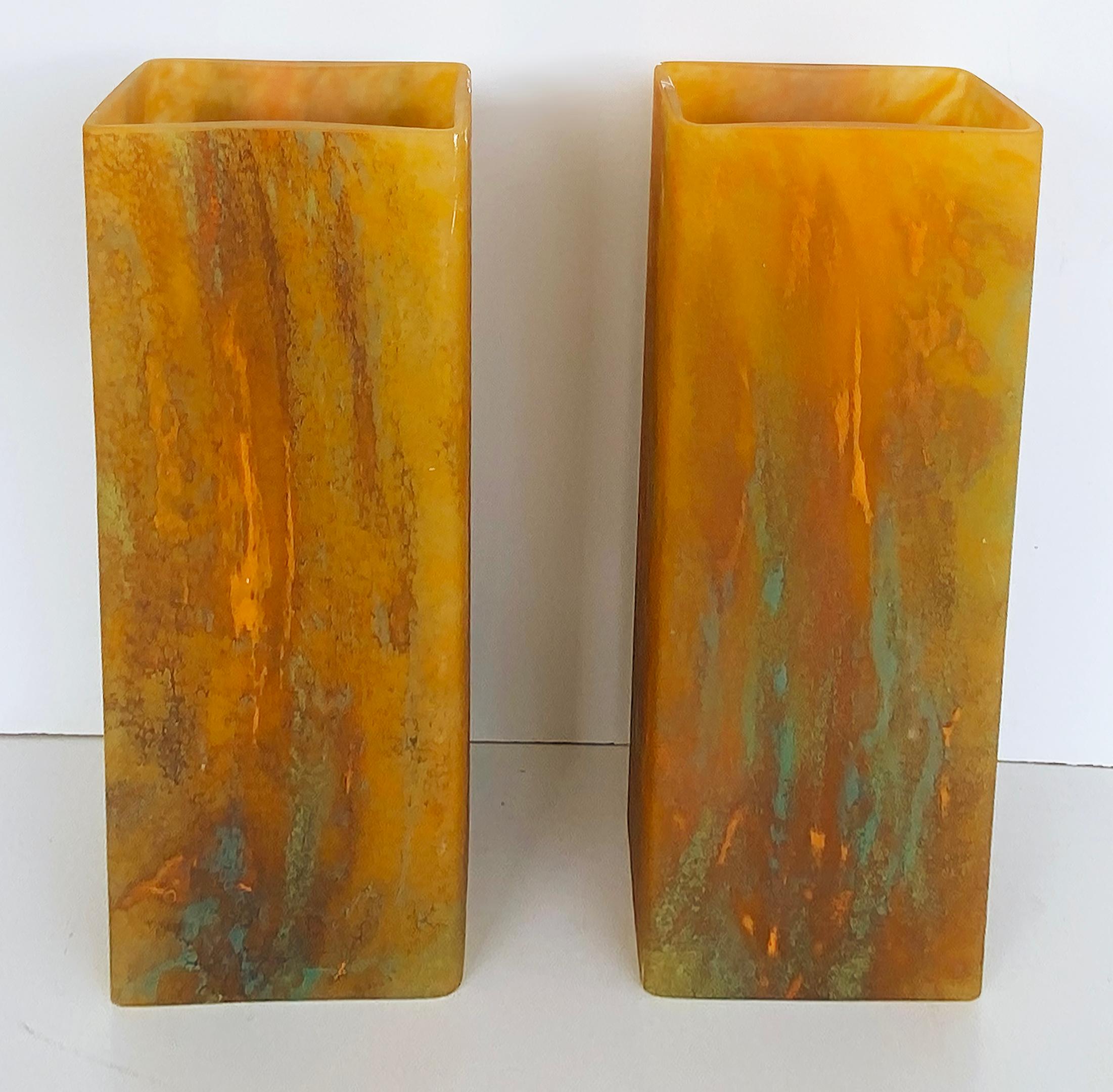 Vintage Pair of Art Glass Wall Washing Sconces with Mounting Brackets

Offered for sale is a pair of hand-blown art-glass molded shade wall sconces. The sconces give a warm glow and wash the wall above with a soft light through the open end of the