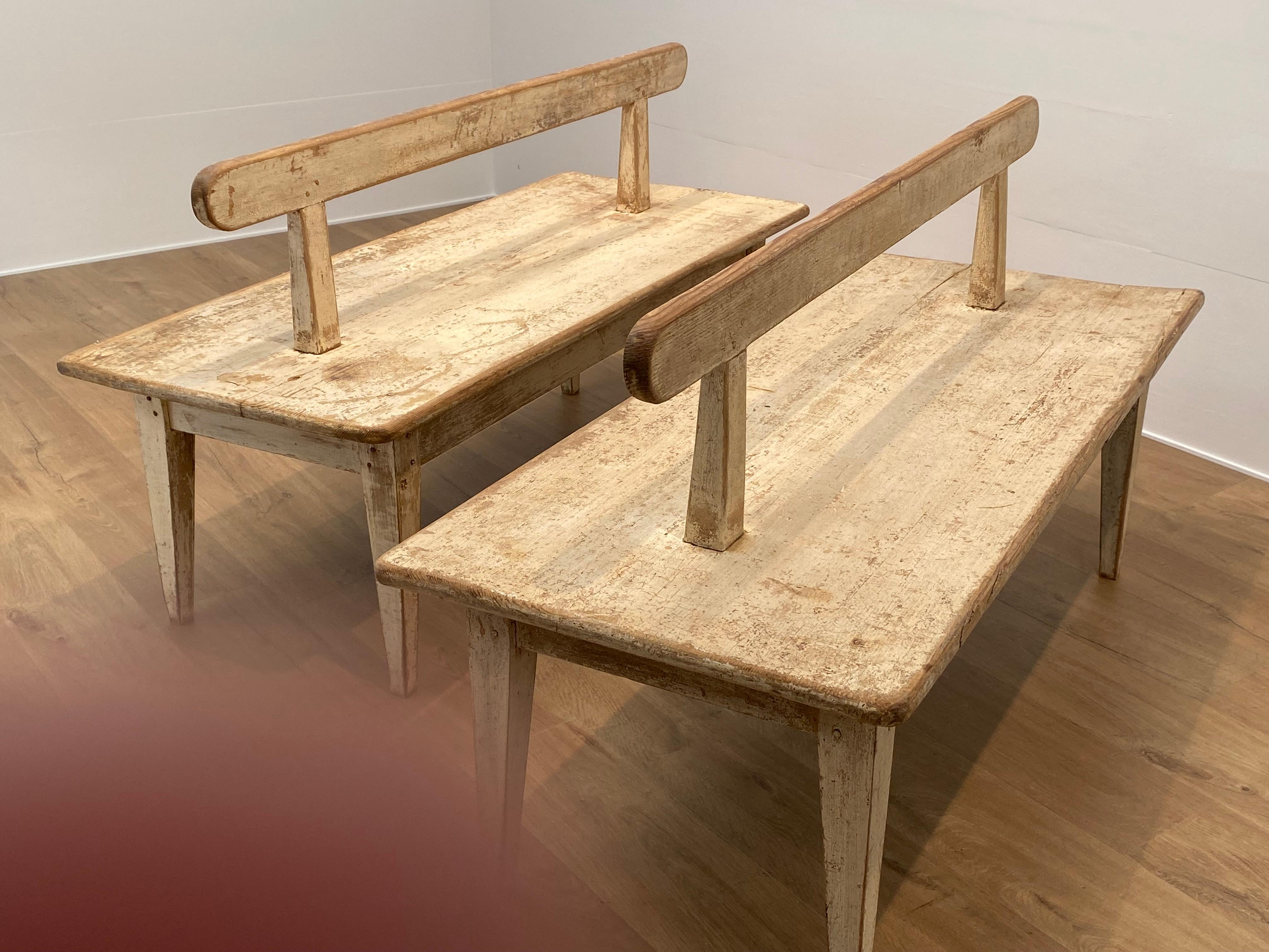 Exceptional pair of French Benches with a great White/Natural color,
double seating, original from a French School on the countryside,
original and beautiful patina and wear of the benches,
very decorative pieces to be used in a kitchen or entryway