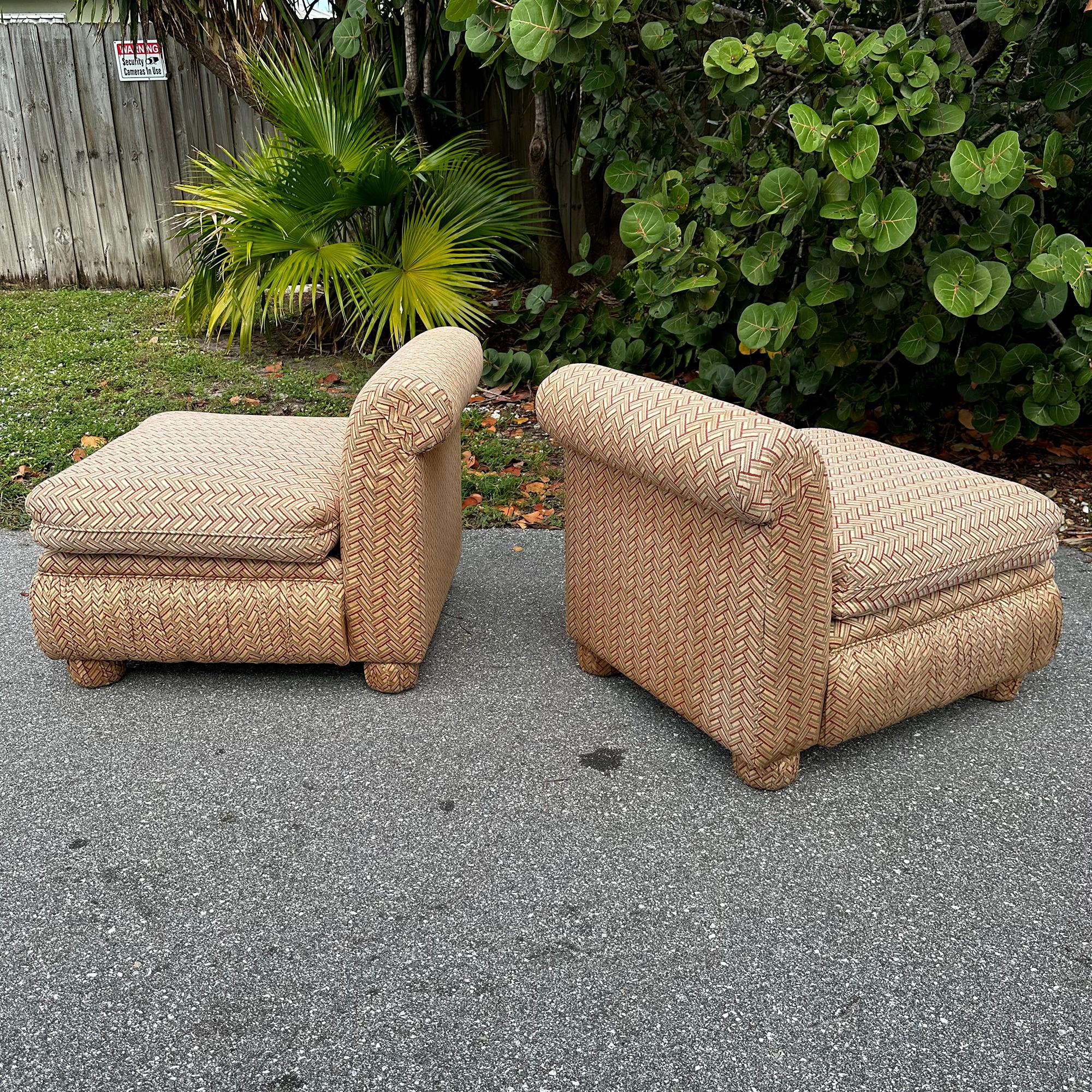 Vintage pair of Billy Baldwin style rollback slipper chairs. These chairs have a pillow backrest and upholstered bun feet. Good vintage condition, original upholstery has some discoloration and should be cleaned or replaced.