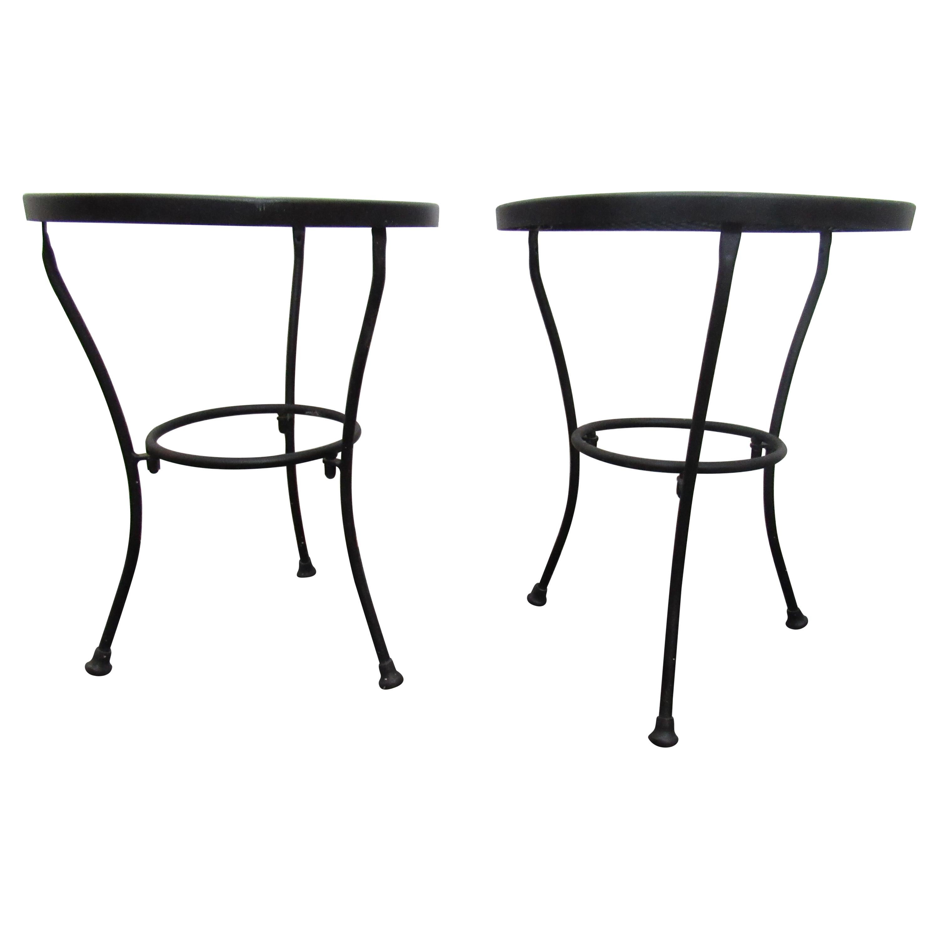 Vintage pair of sturdy black metal side tables, for indoor or outdoor use. Please confirm item location with seller (NY/NJ).