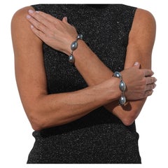 Vintage pair of bracelets. Silver and Grey Mother of Pearl.