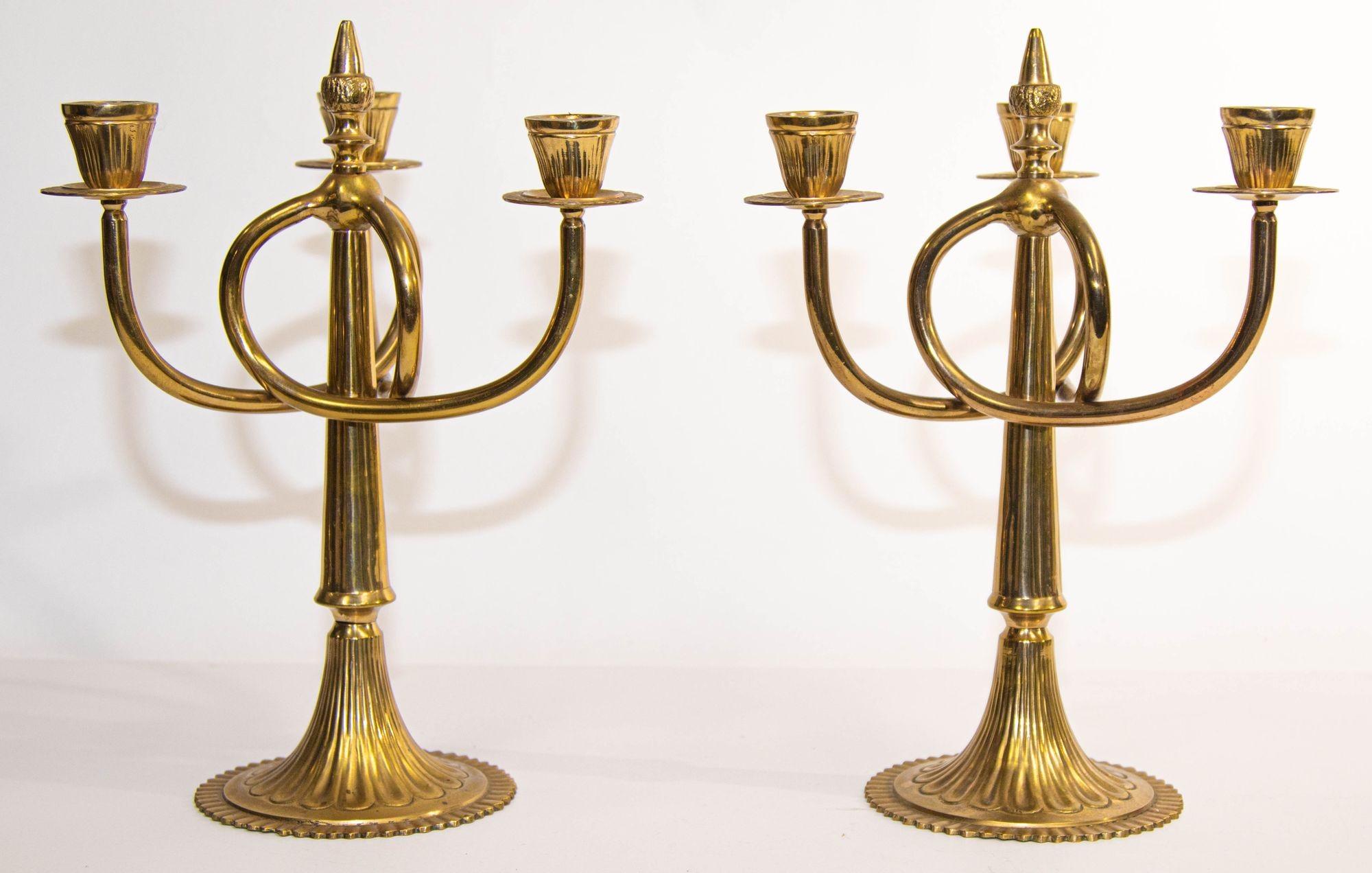 Beautiful Pair of Art Nouveau style solid brass candelabras with three branches with bobeches.
Fantastic large size organic brass candle holder or candelabra with twisting arms.
A stunning pair of mid 20th century twisted branch three arms