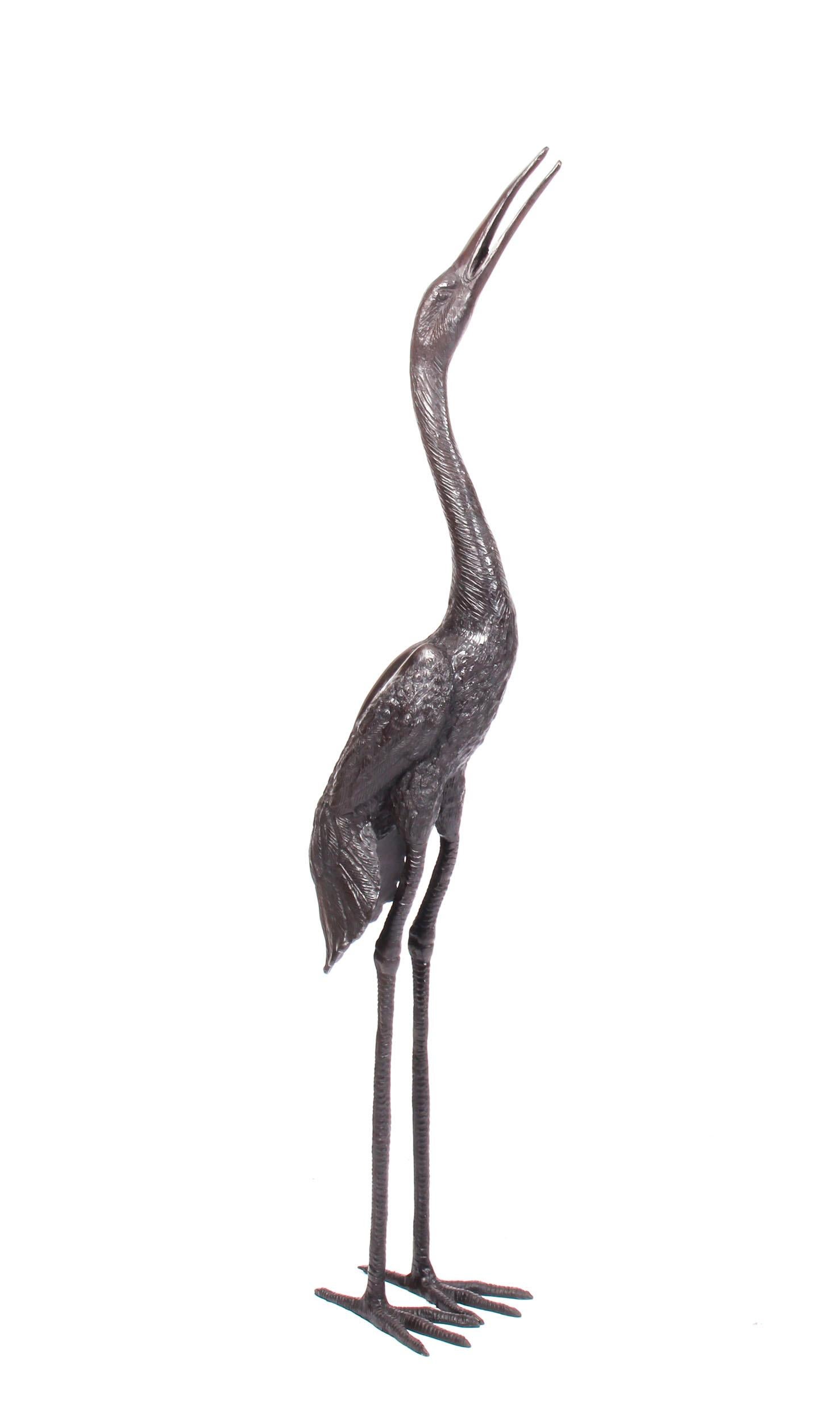 This is a stunning pair of solid bronze cranes dating from the last quarter of the 20th century.

This remarkable bronze pair features the two birds in a highly life-like fashion - with their characteristic long legs, tall bodies, and the sharp,