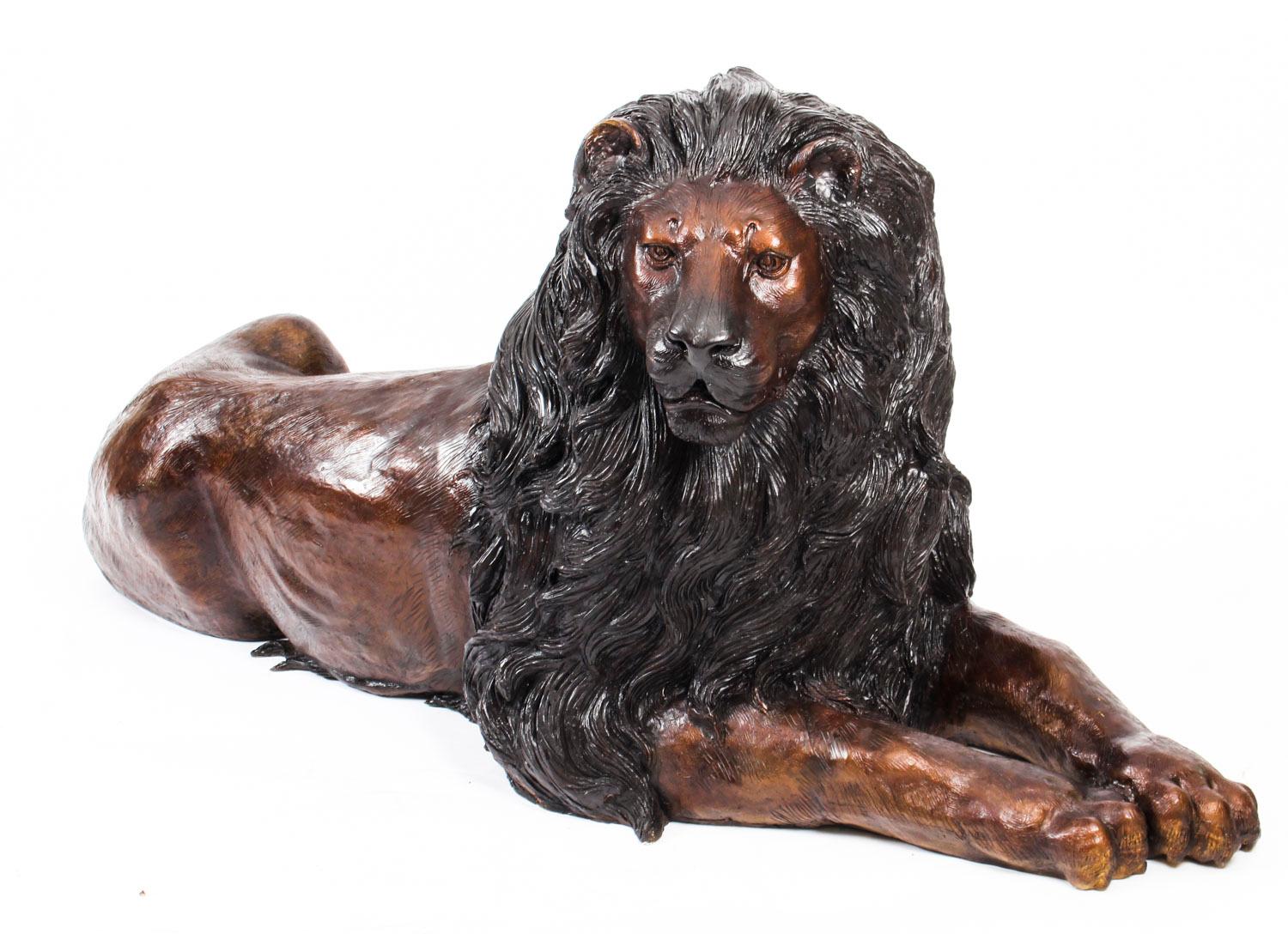 This is a very interesting bronze sculpture of a pair of lions, dating from the second half of the 20th century.

The lions are lying down in a relaxed pose with toned muscles and sleek detailed manes. This signifies their masculinity and reflects