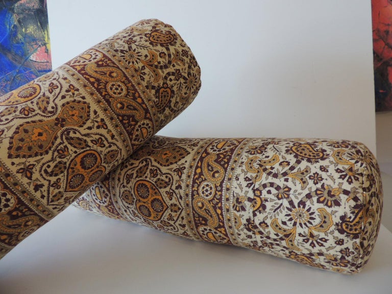 Indian Vintage Pair of Brown and Yellow Paisley Round Decorative Bolsters For Sale