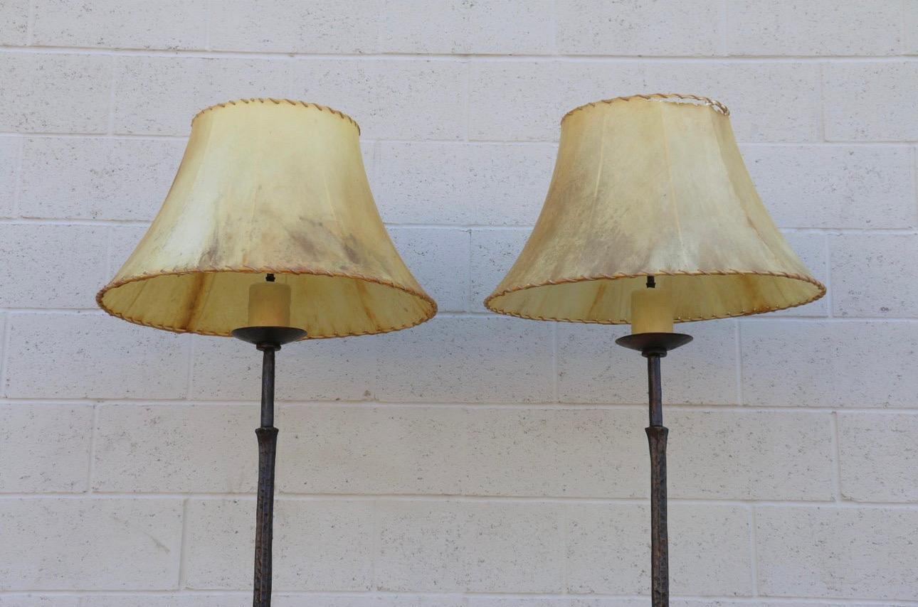 American Vintage Pair of Brutalist Bronze Tripod Base Floor Lamps with Goatskin Lampshade For Sale