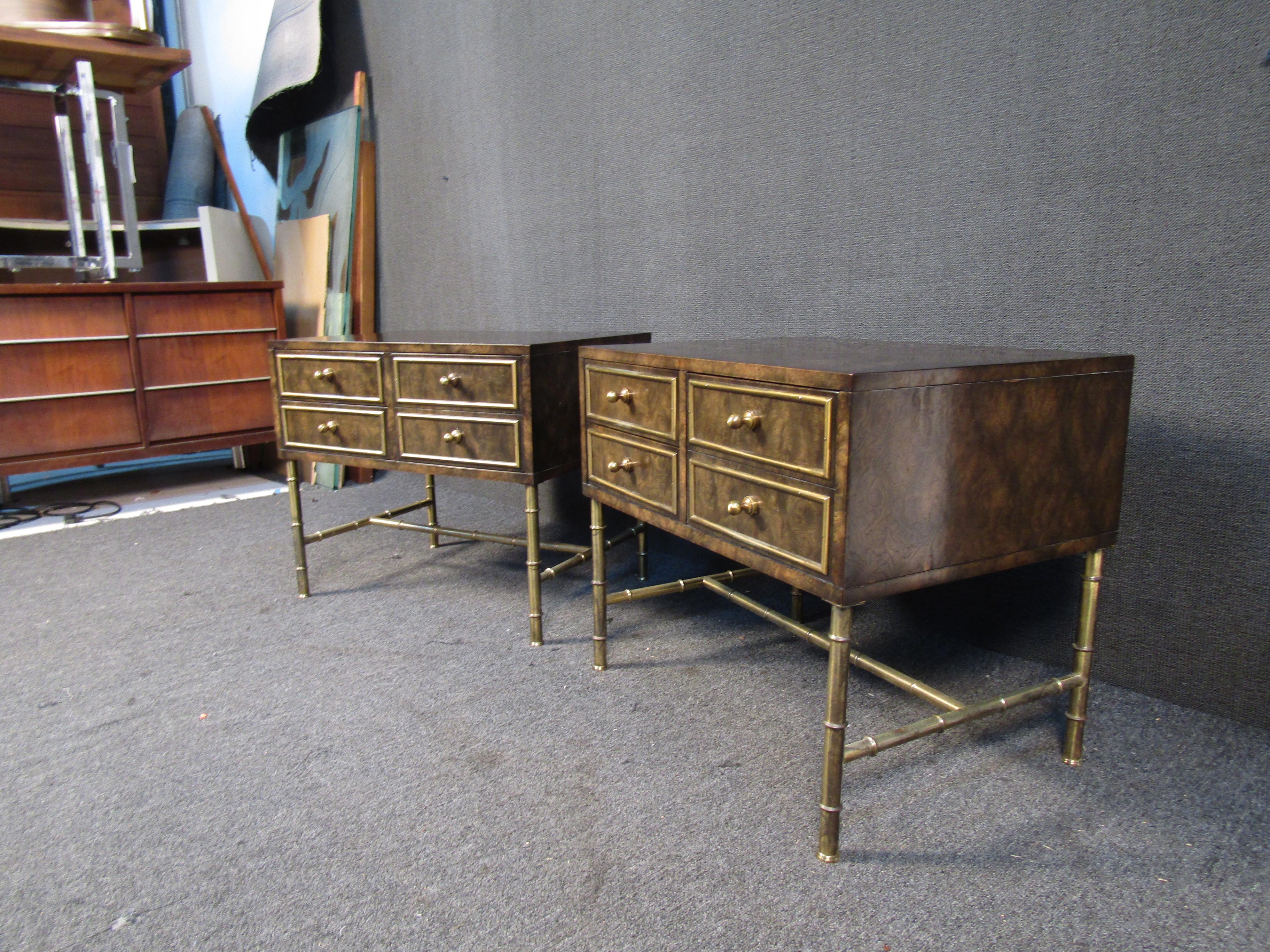 A vintage pair of night stands by Mastercraft that pair dark burl wood with brass accents for a bold and elegant look. Large drawers and quality mid-century craftsmanship make these a great investment in any bedroom. Please confirm item location
