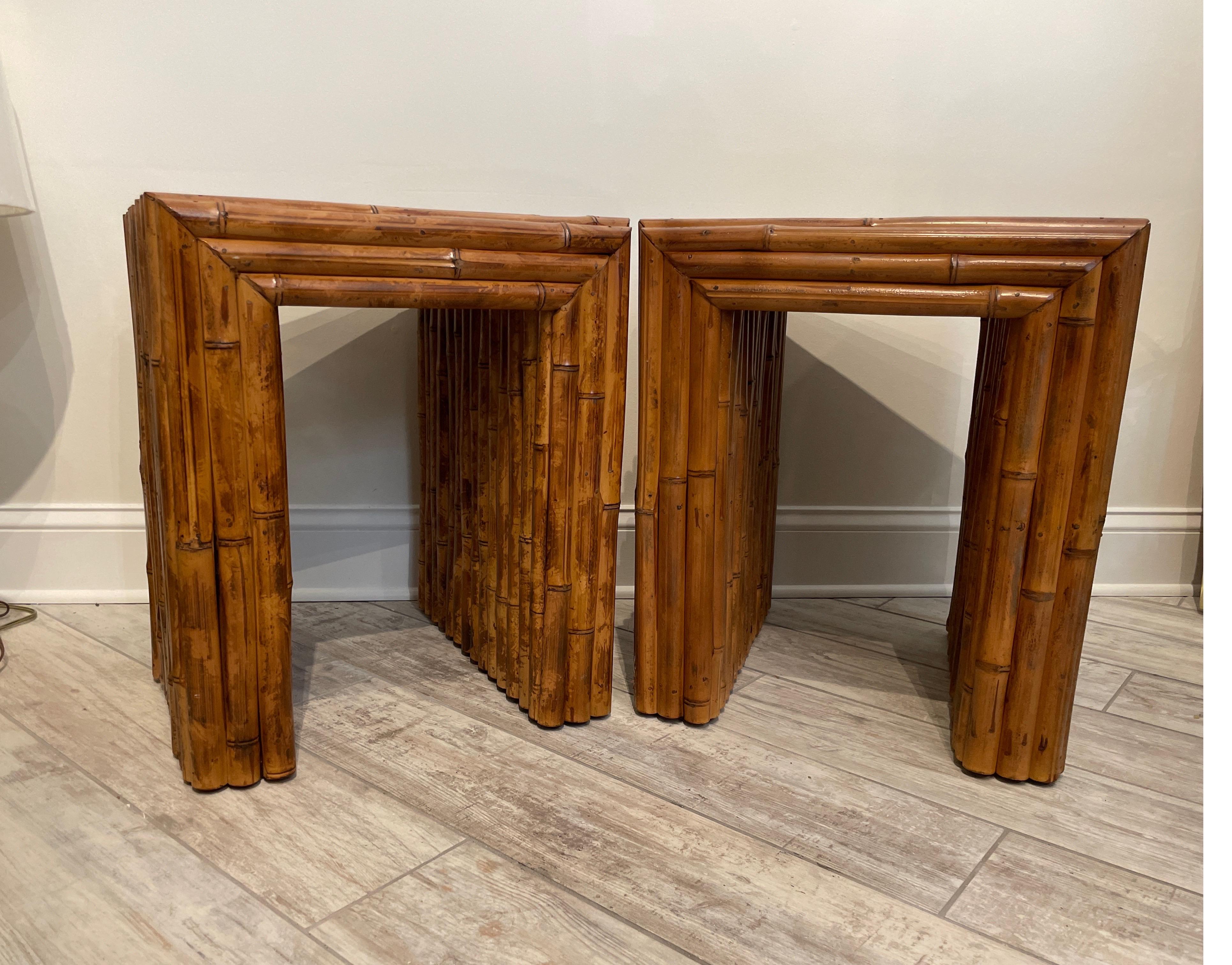 Great pair of vintage bamboo wrapped side tables. Completely covered on all sides & in center. Applied over wood base which makes them very sturdy. A wonderful addition to any room.