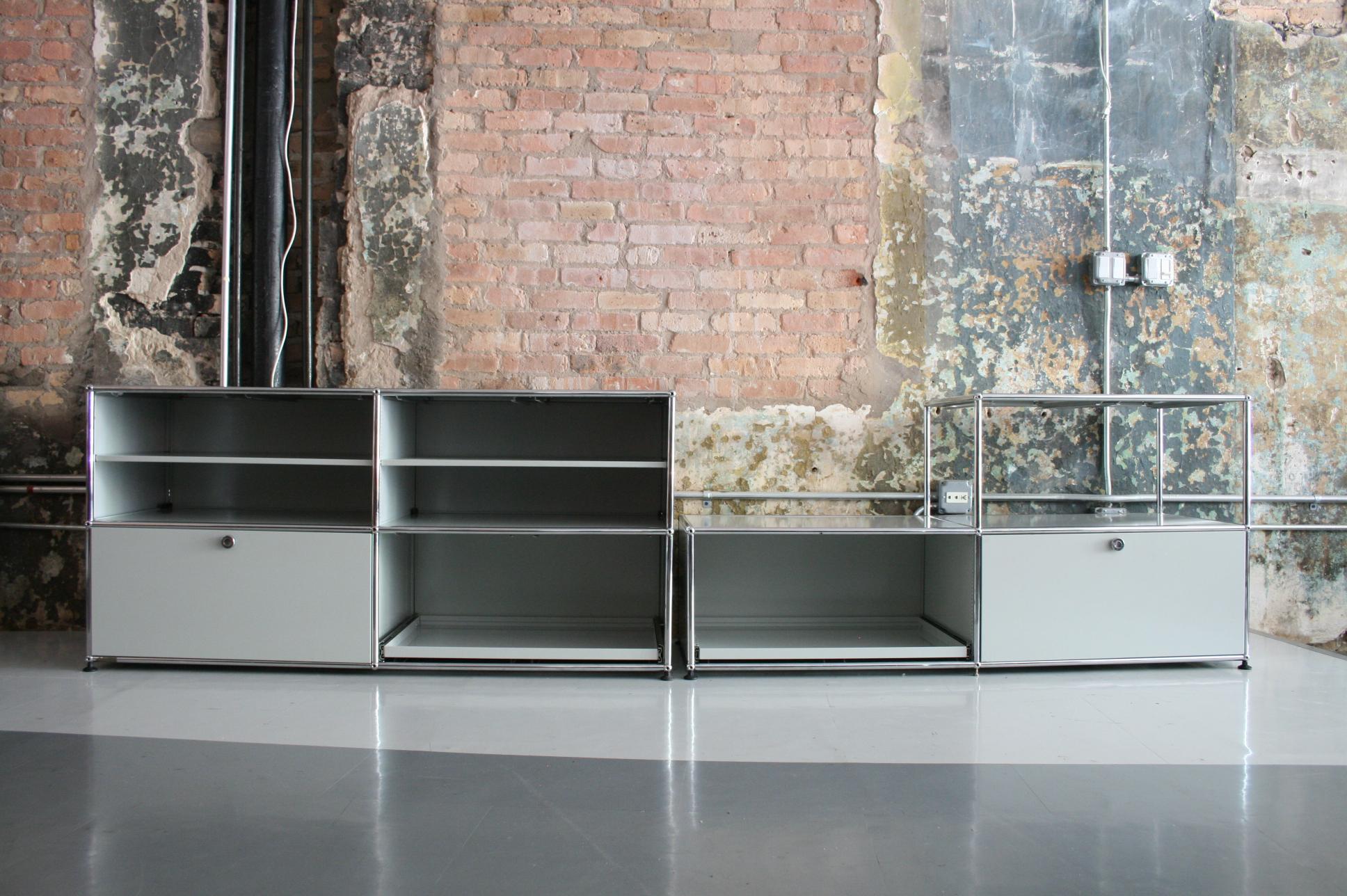 USM Haller pair of media cabinets / sideboards/ credenzas. Each cabinet features a pull out / pull-out tray, a pull out / pull-out drawer and shelves. Excellent condition.
