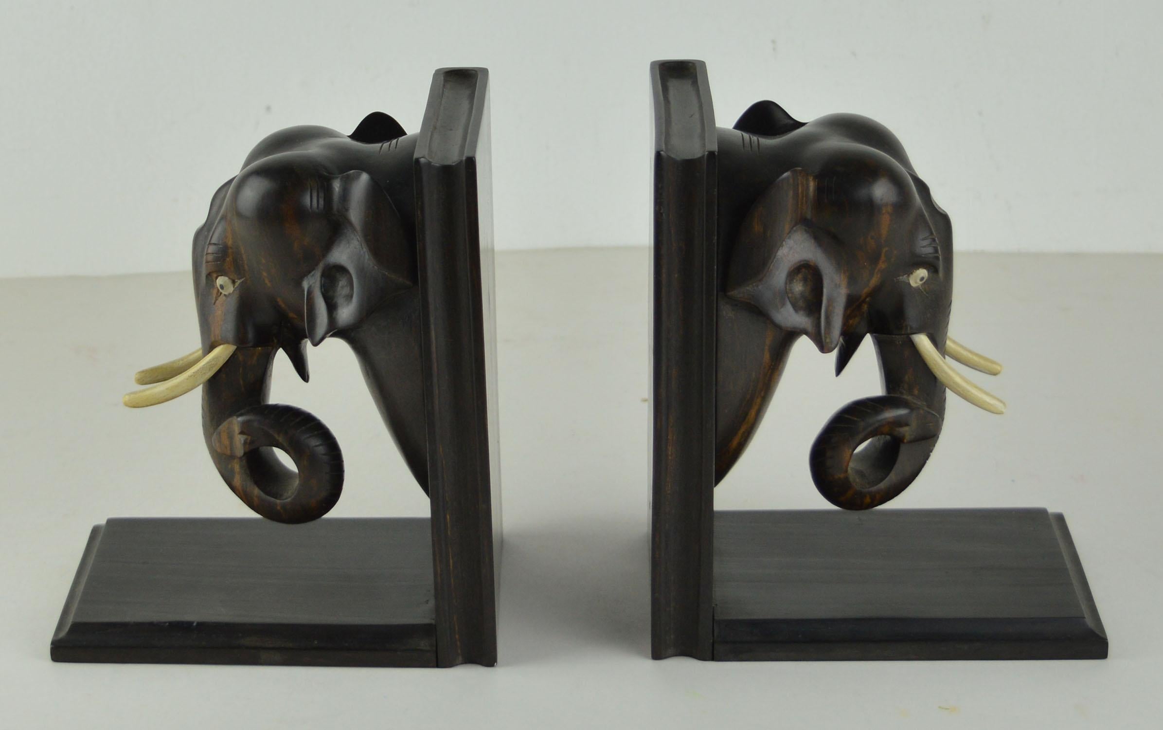 Chic pair of elephant bookends.

Carved ebony and painted wood.

Nice quality

Probably Indian, 1920s.

The measurement given is based on one of them






    
