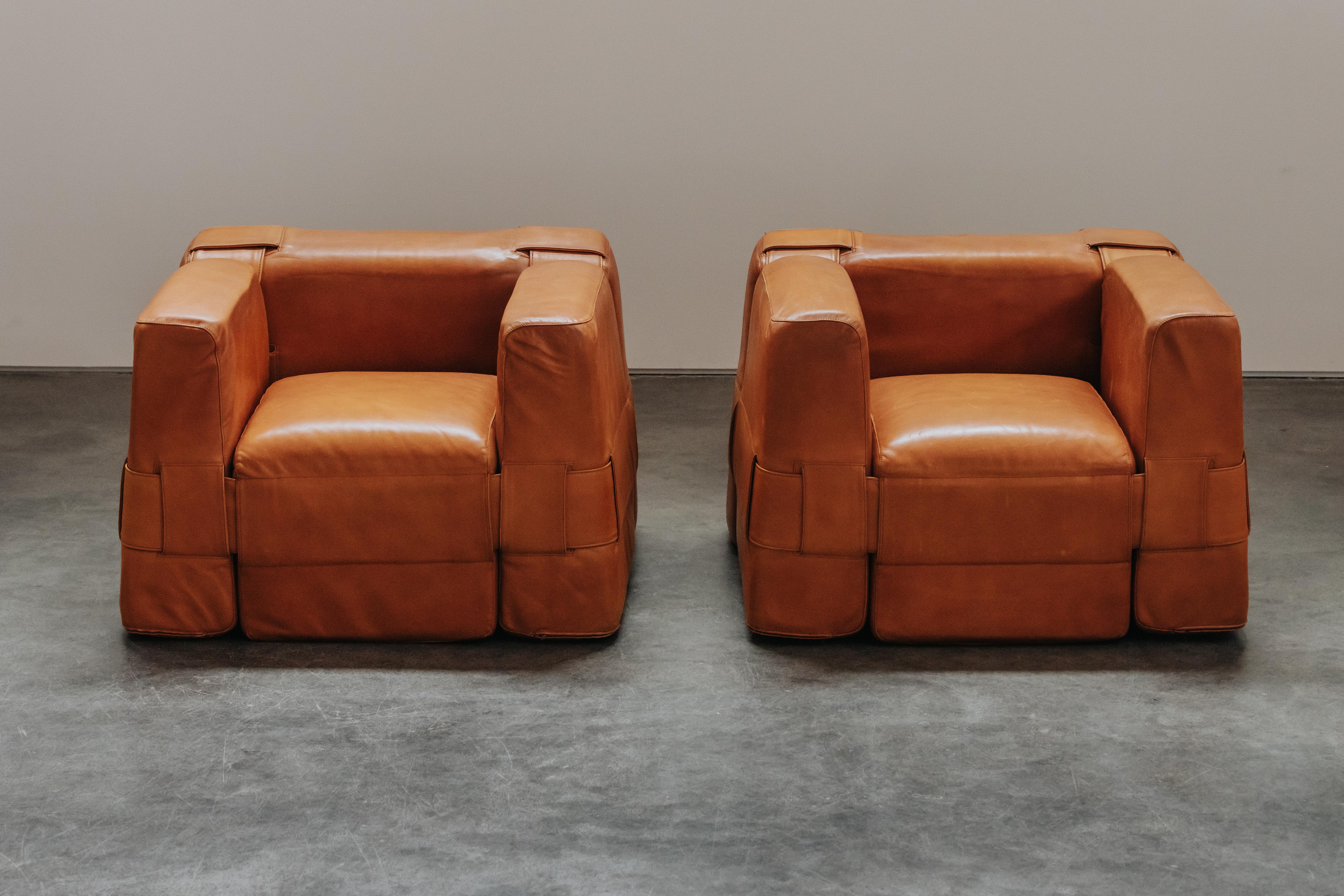 Vintage Pair Of Cassina 932 Lounge Chairs By Mario Bellini From Italy, Circa 1960. Rare pair with original cognac leather.  Great patina and use.