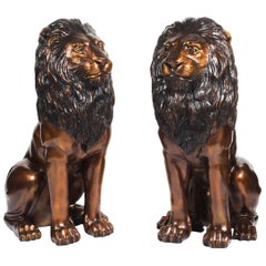 Vintage Pair of Cast Bronze Seated Lions, 20th Century