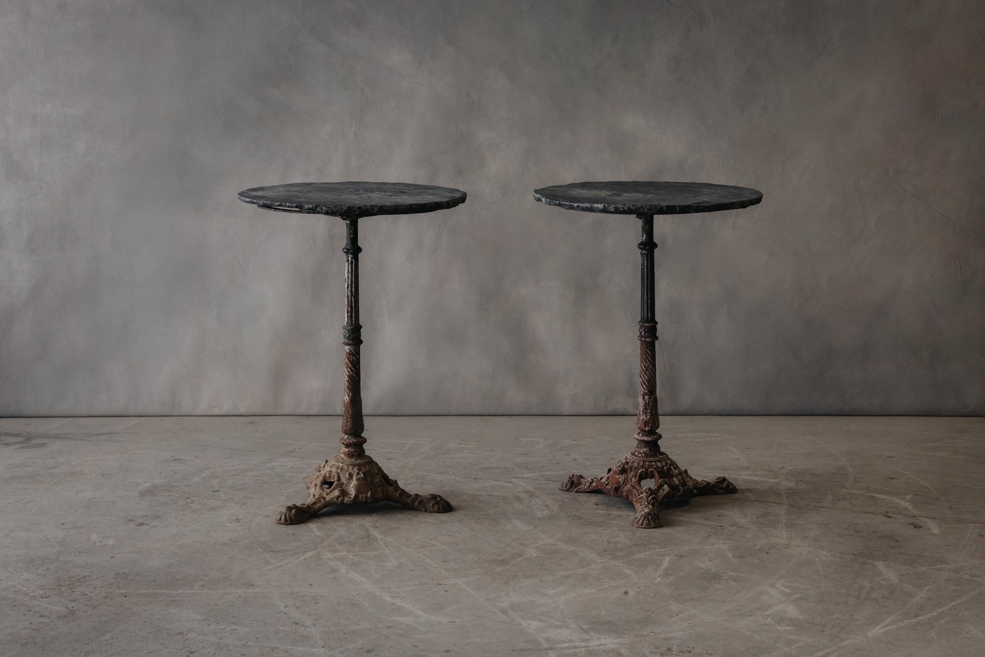 Vintage Pair Of Cast Iron And Slate Bistro Tables From France, Circa 1950.  Unusual pair with nice original patina and wear.  

