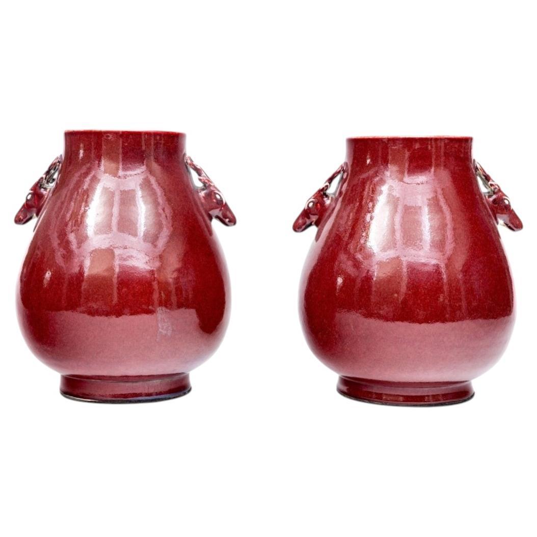 Vintage Pair Of Chinese Sang De Boeuf Hu Form Vases With Deer Head Handles