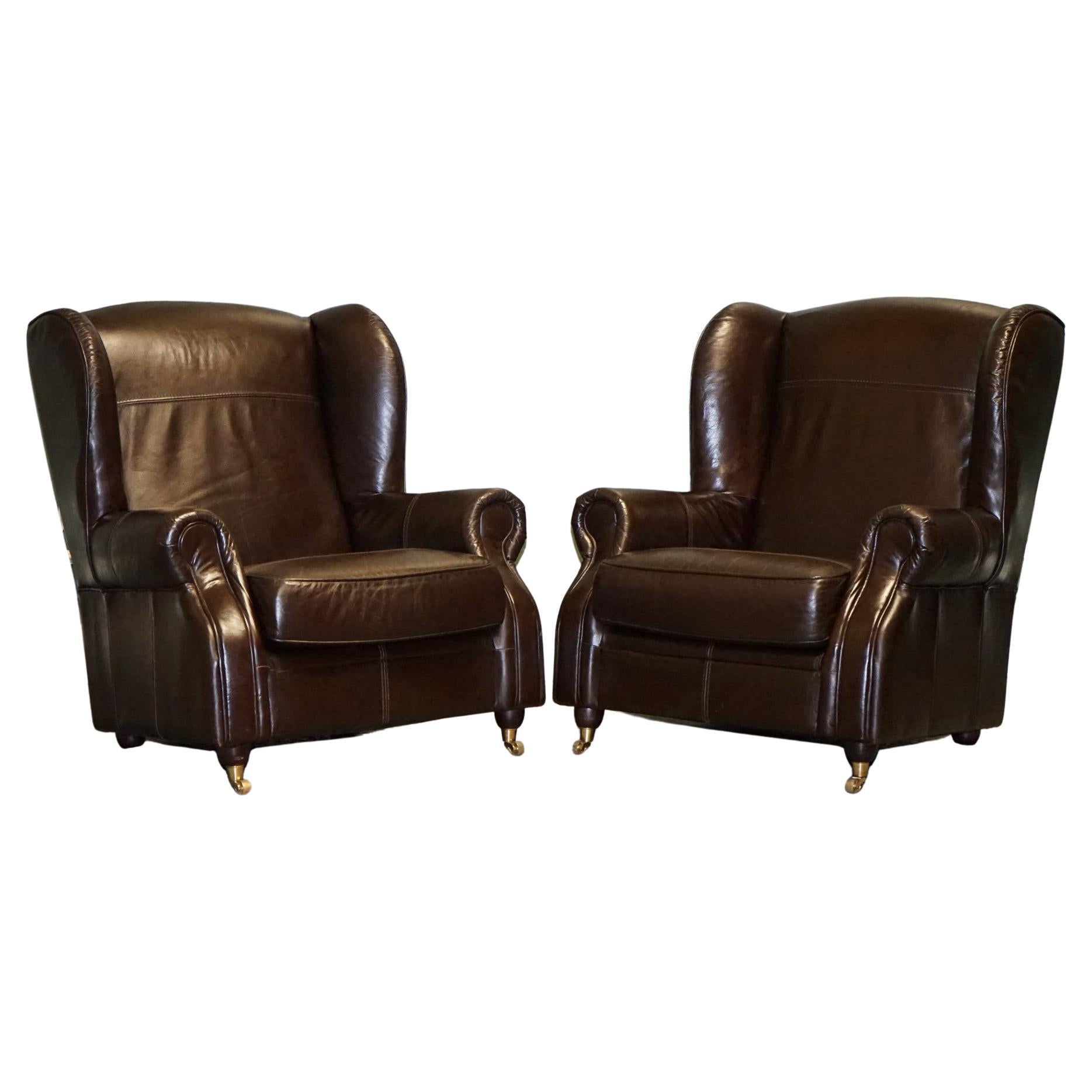 ViNTAGE PAIR OF CHOCOLATE BROWN LEATHER WINGBACK CHAIRS