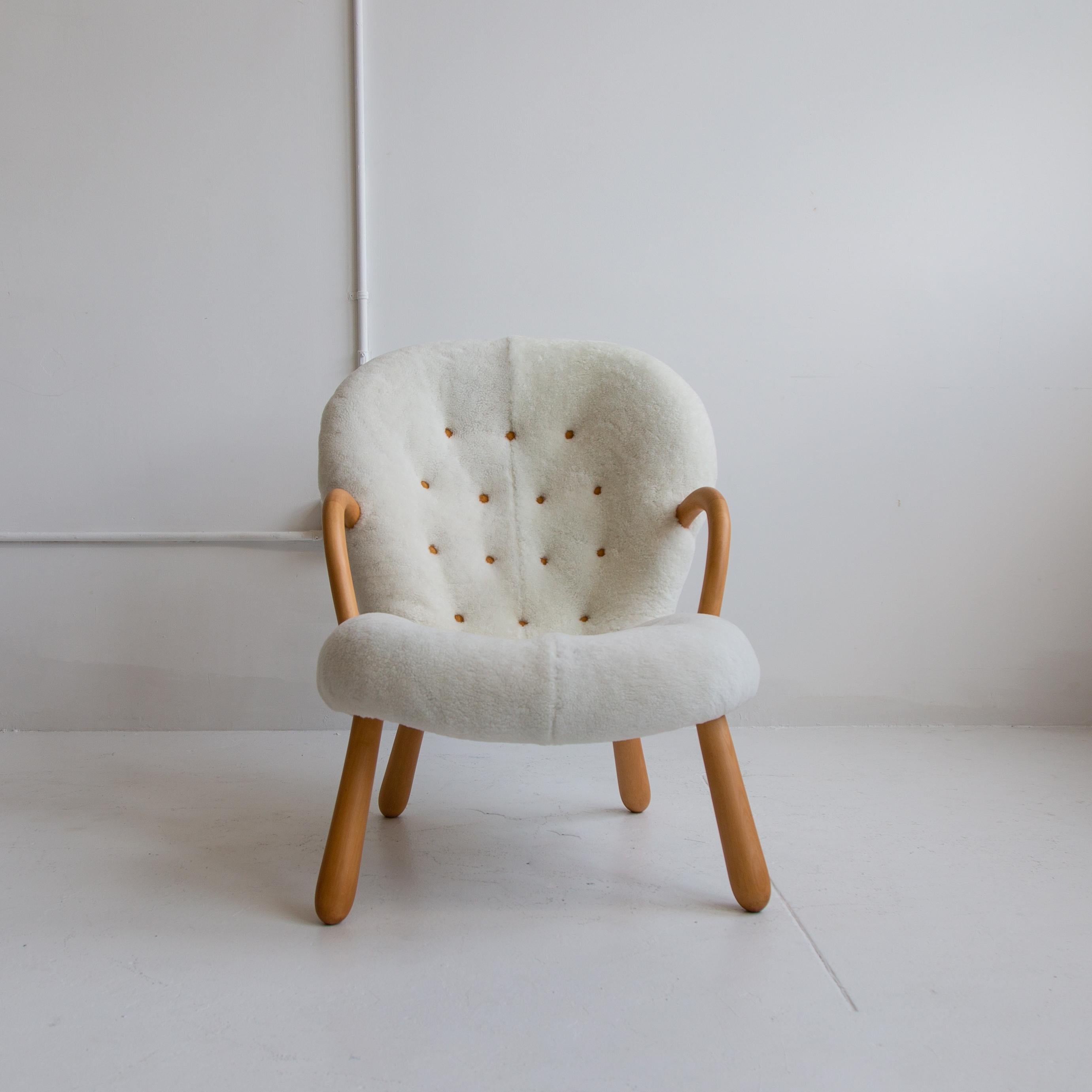 philip arctander clam chair reproduction