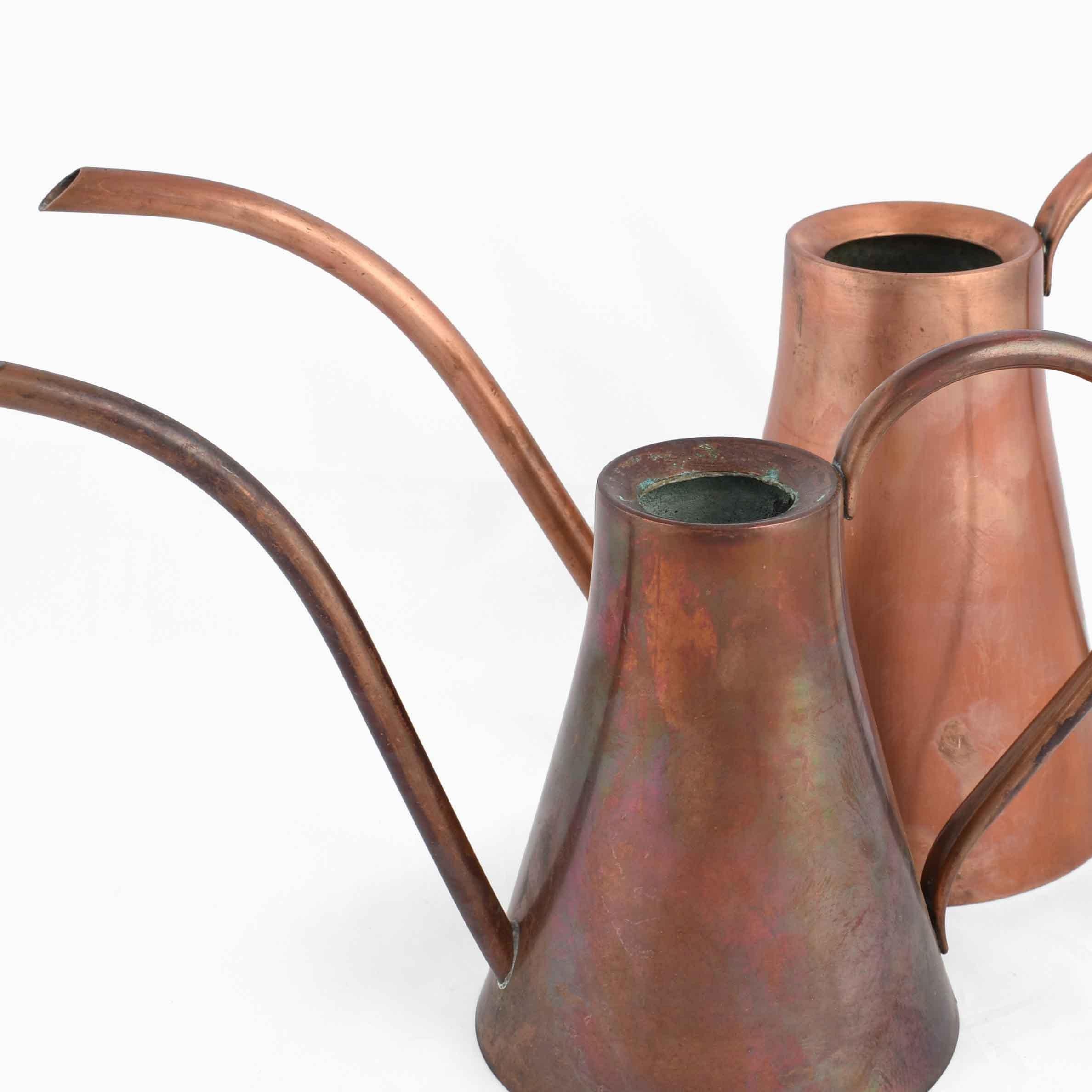 Pair of Pitchers is an original decorative pair of objects realized between the 1950s and the 1960s. 

Original copper. 

Created by Harald Buchrucker. Made in Germany. The monogram of the artist is present on the base. 


Good conditions: