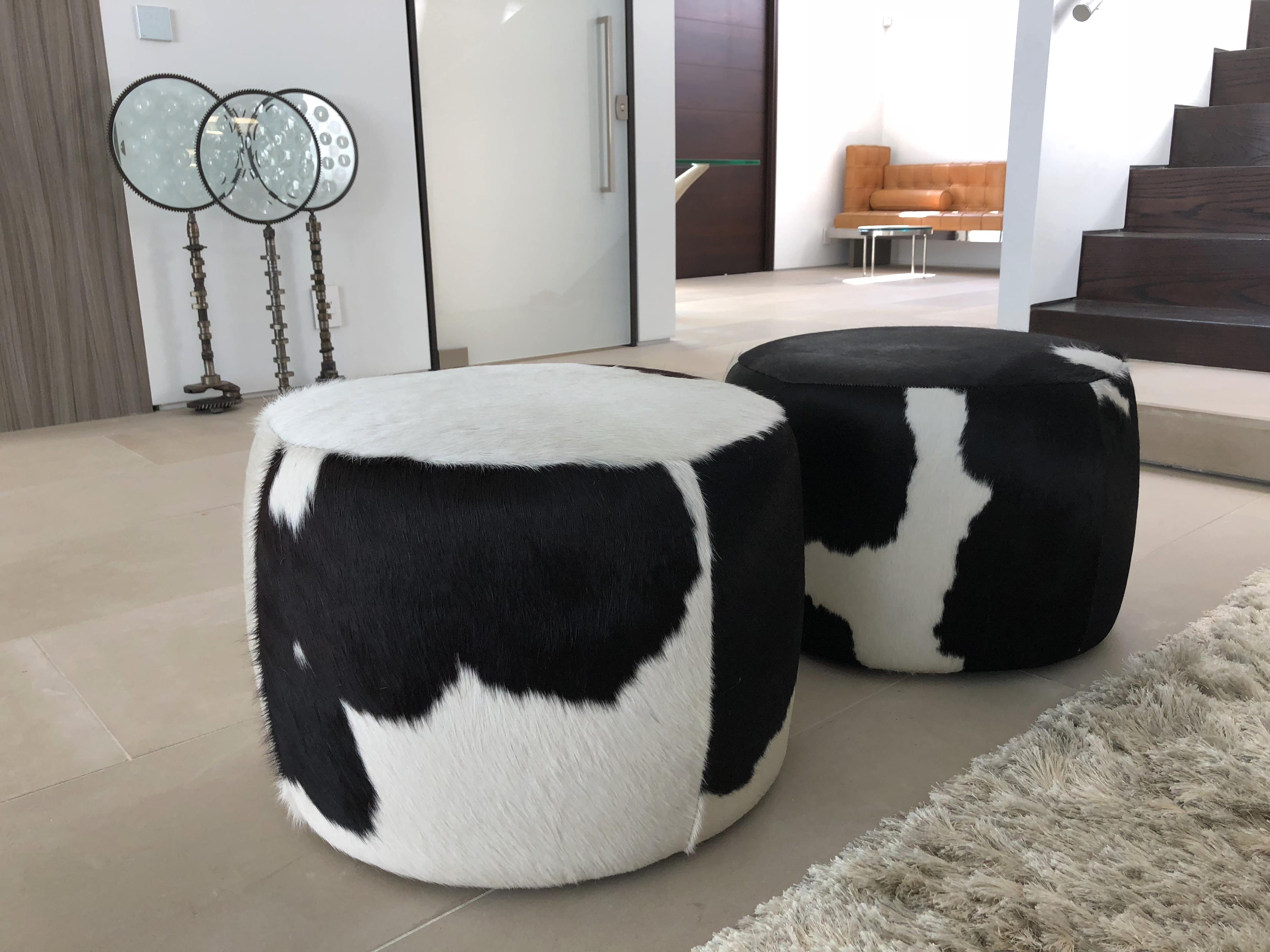 Modern Vintage Pair of Cowhide Poufs or Ottomans