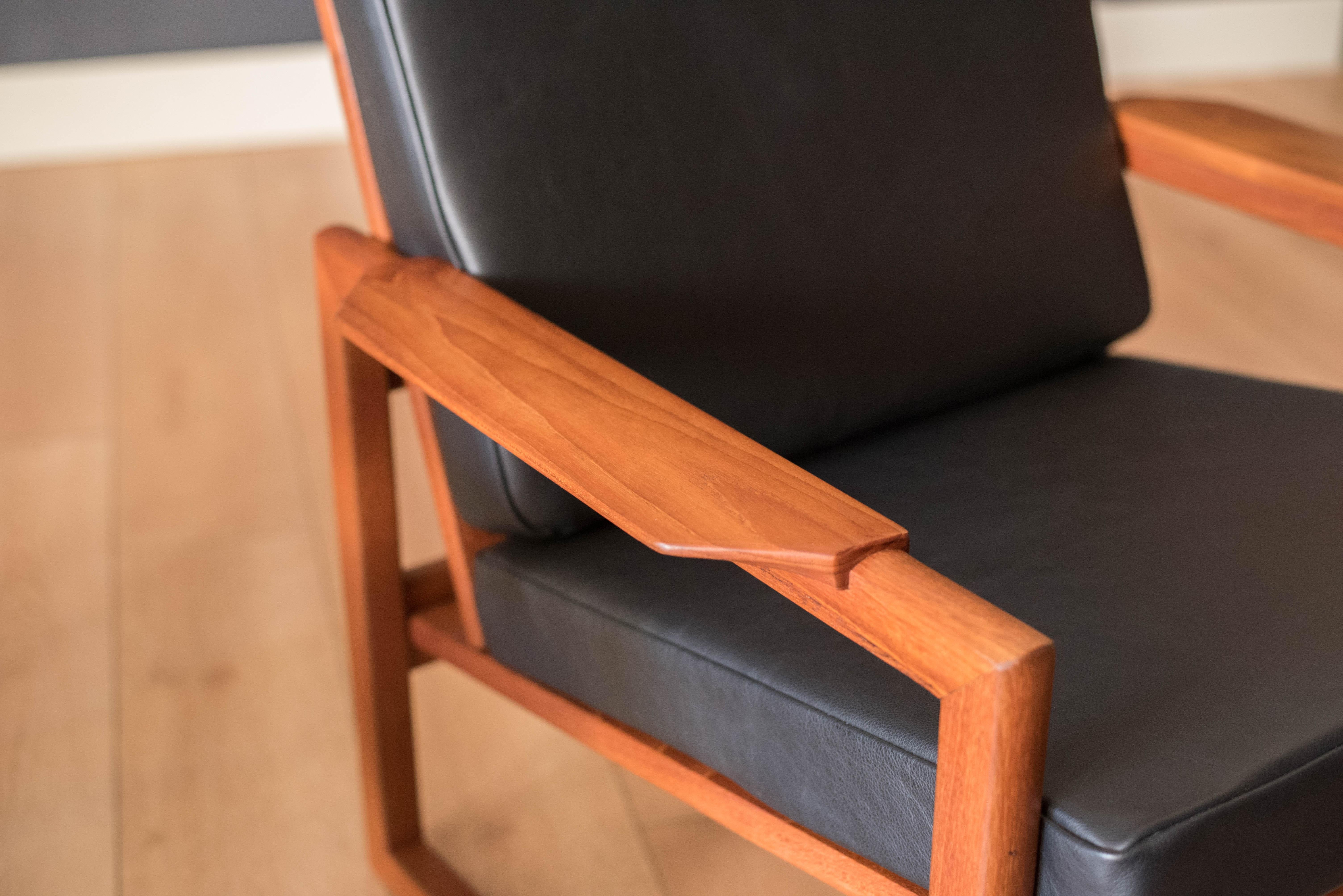 Mid-20th Century Vintage Pair of Danish Teak and Black Leather Lounge Chairs by Sven Ellekjaer