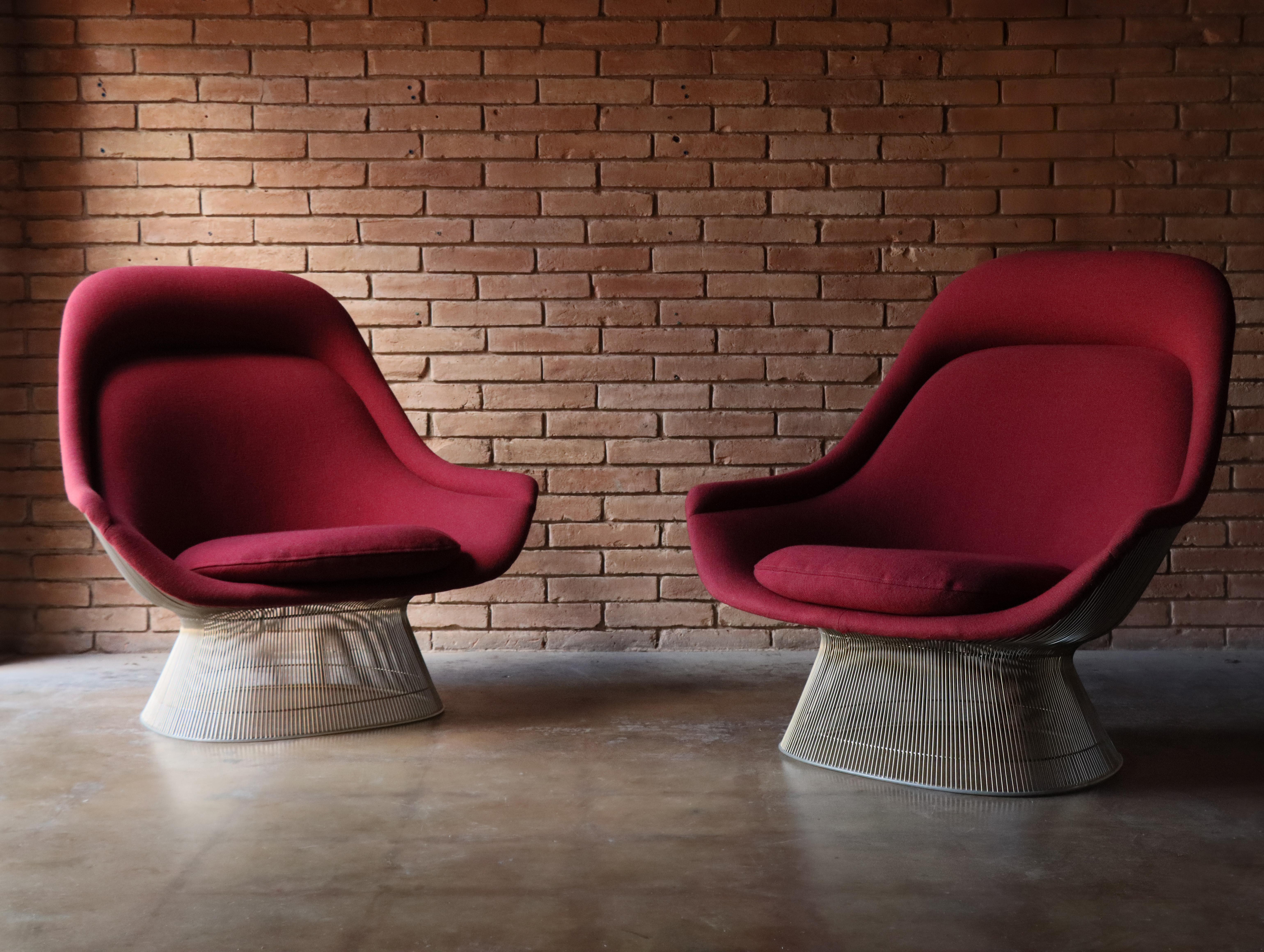  An all original pair of Model 1705 “throne” lounge chairs with burgundy Knoll fabric designed by Warren Platner for Knoll.

 Zinc steel wire rods are bent and welded to form a graceful and sculptural frame. A generously sized lounge chair, each