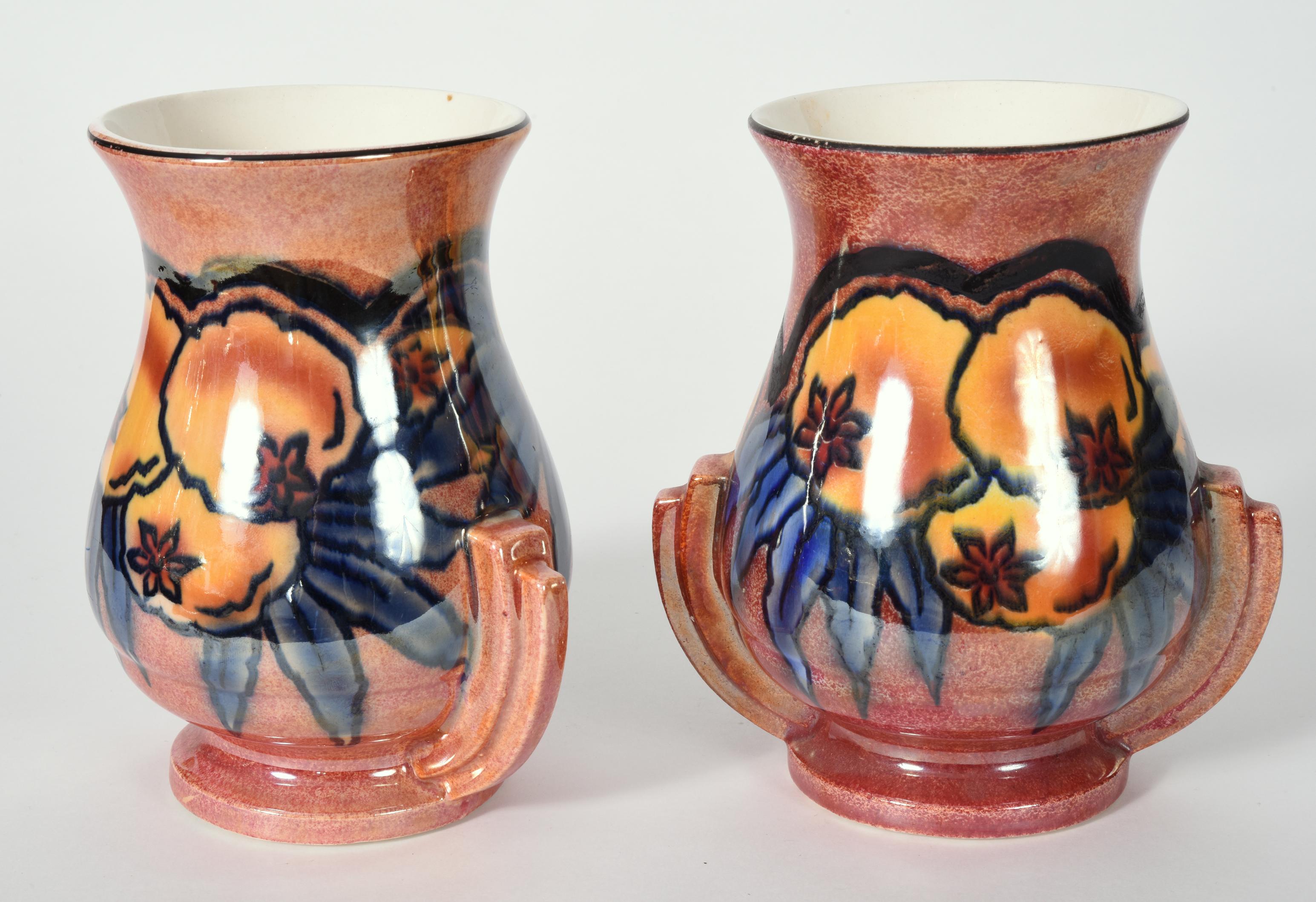 Vintage pair of English glazed art pottery vases / decorative pieces. Each vase is in excellent vintage condition, Maker's mark undersigned. Each vase measure about 7 inches high X 7 inches diameter.