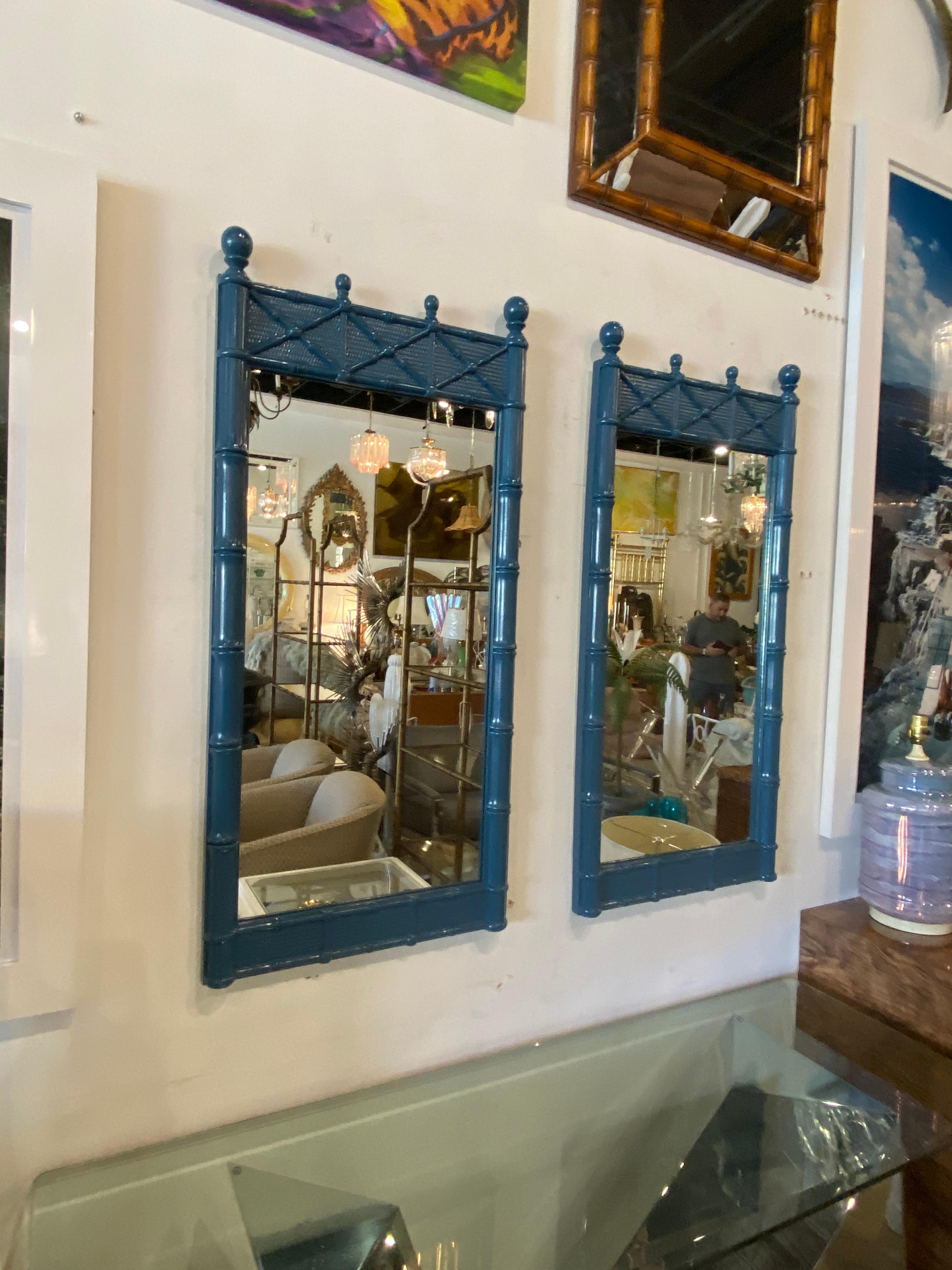 Lovely pair of vintage faux bamboo wall mirrors. These have been newly lacquered in a lovely blue gloss lacquer. They come ready to hang on your wall.