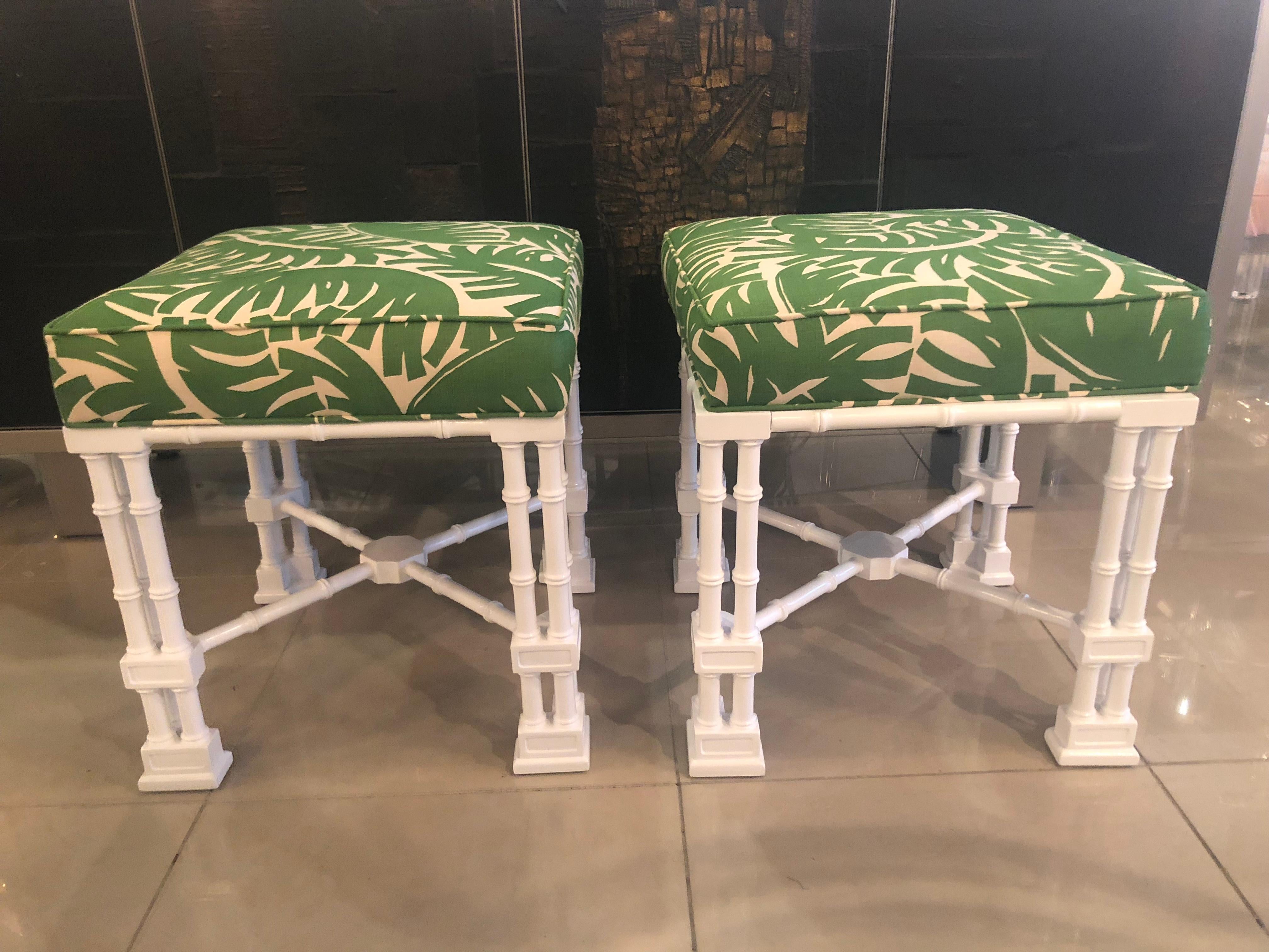 Vintage faux bamboo pair of newly lacquered gloss white benches stools ottomans. Newly upholstered in a vintage palm tree fabric.