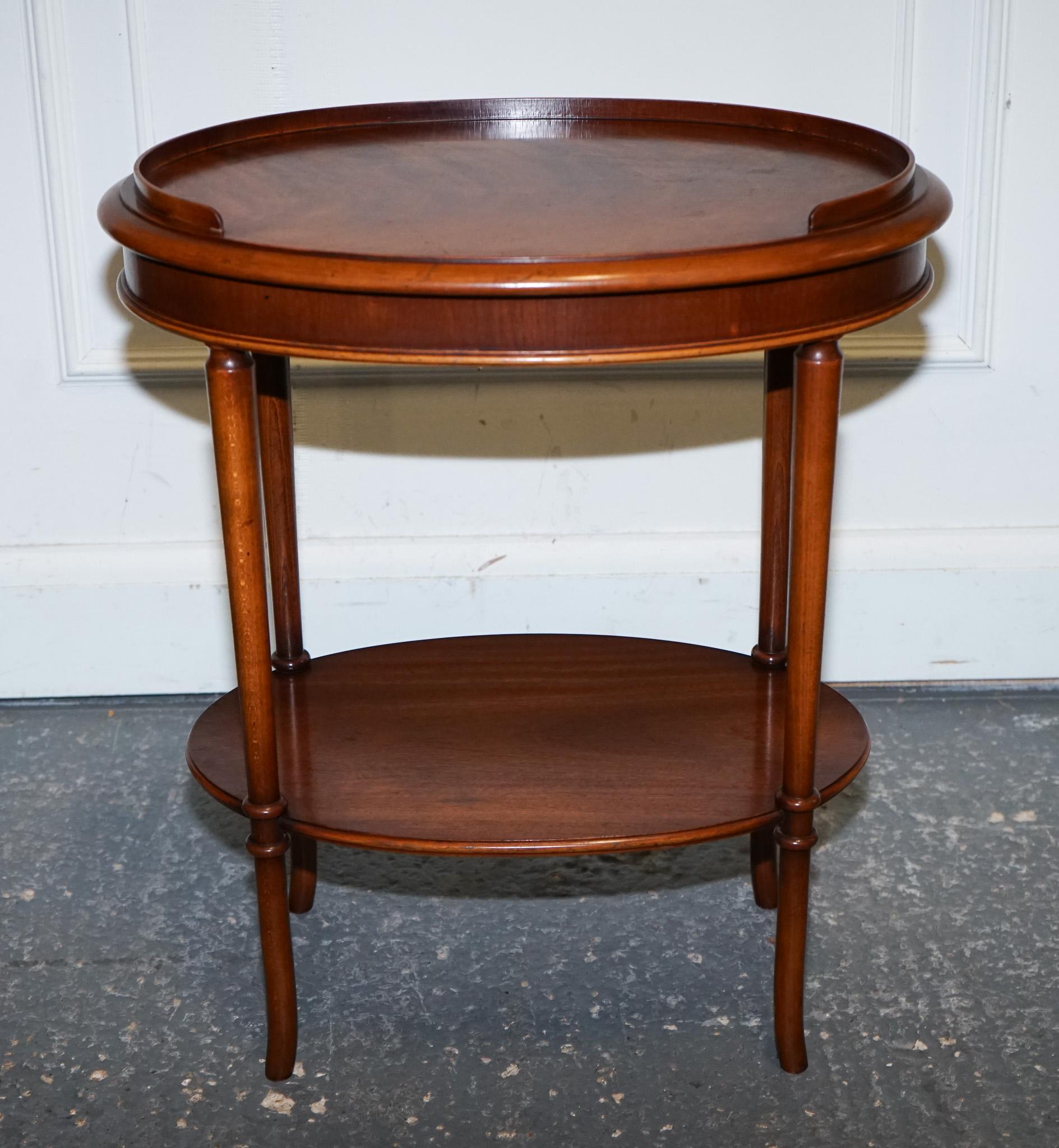 Yew VINTAGE PAIR OF FLAMED MAHOGANY OVAL SIDE END WINE LAMP TABLE GALLERY RAiL TOP For Sale