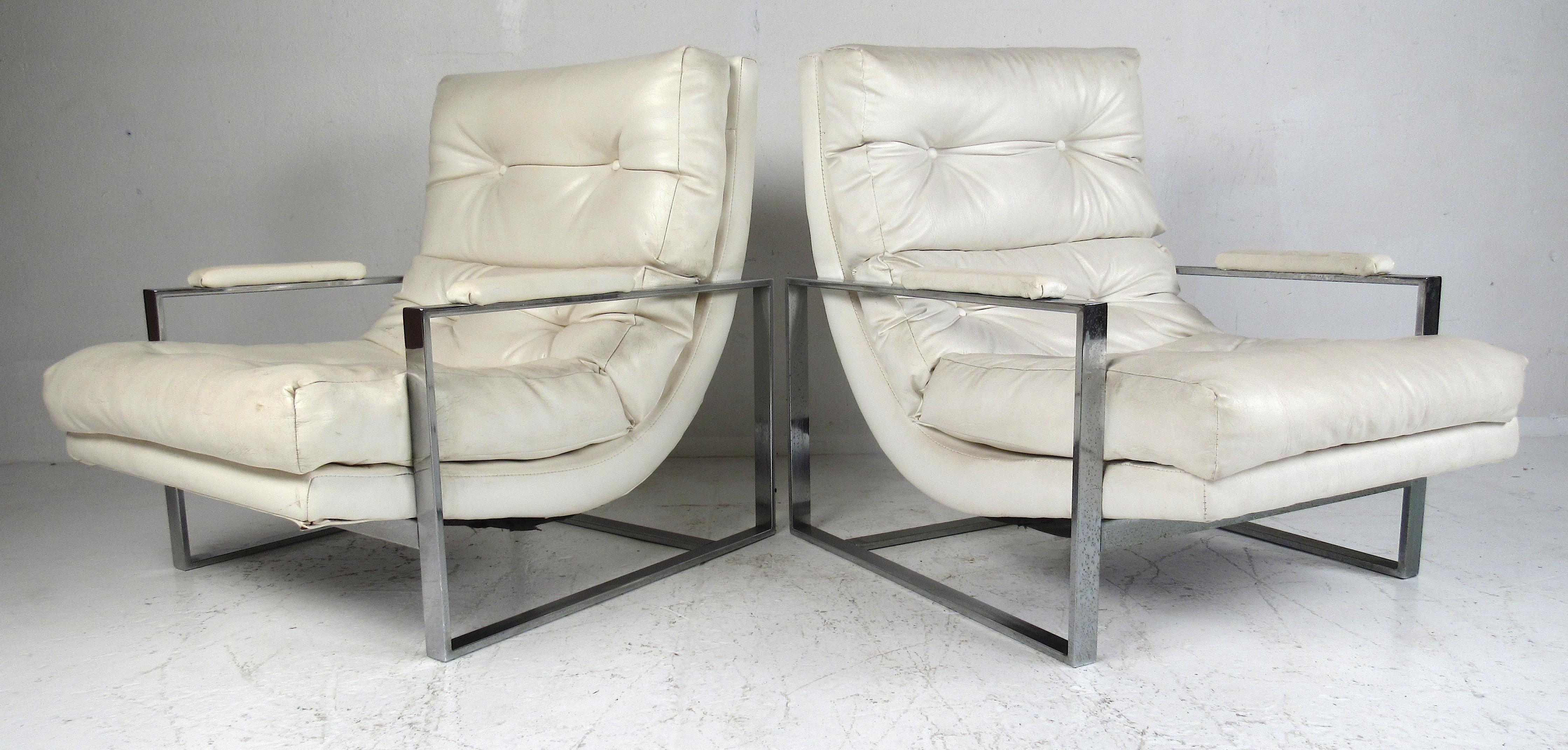 Milo Baughman style flat bar chrome frame lounge chairs with upholstered armrests and single matching ottoman. Please confirm item location (NY or NJ) with dealer.