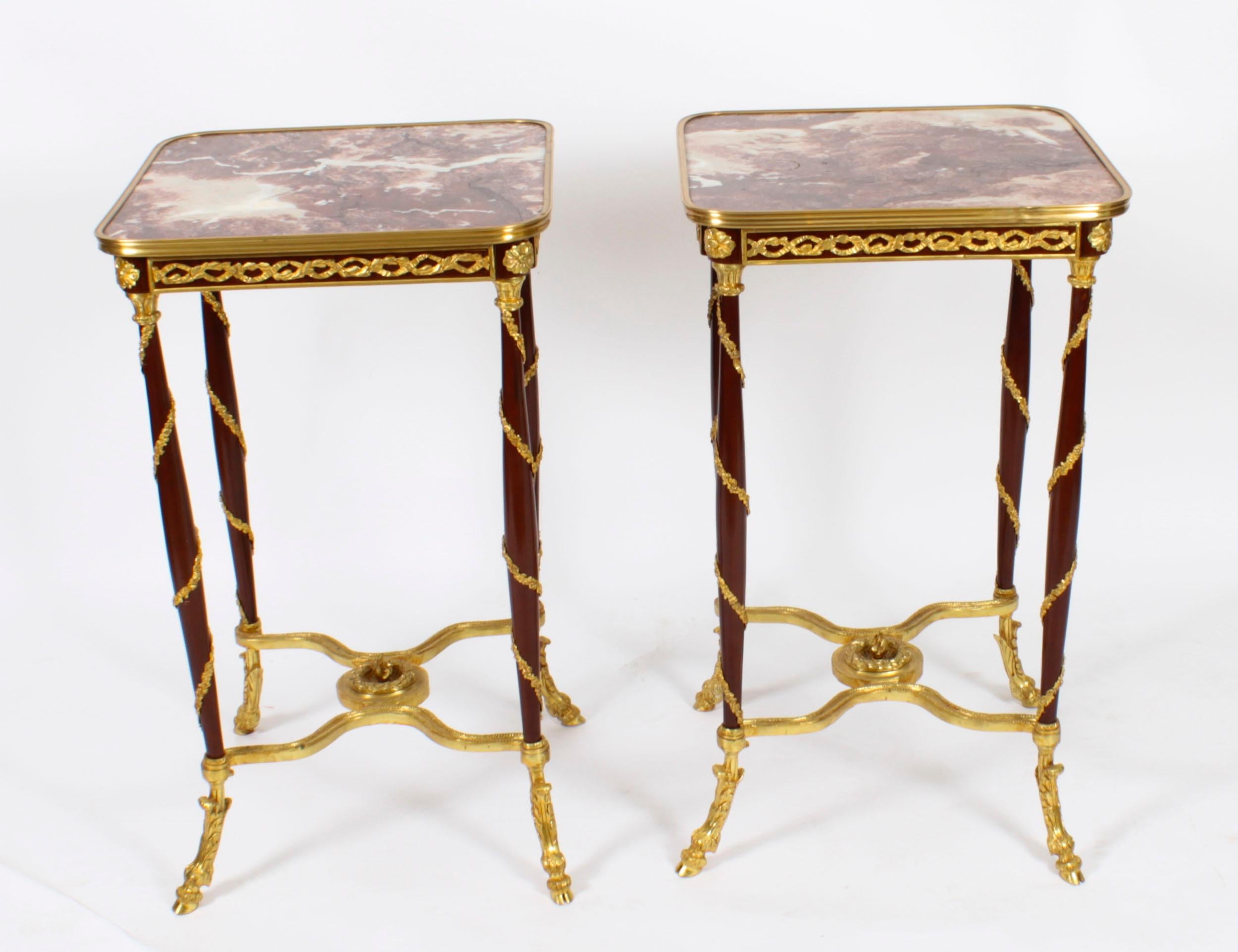 This is a beautiful pair of vintage French Louis Revival ormolu mounted side tables, mid-20th century in date.

The square shaped 