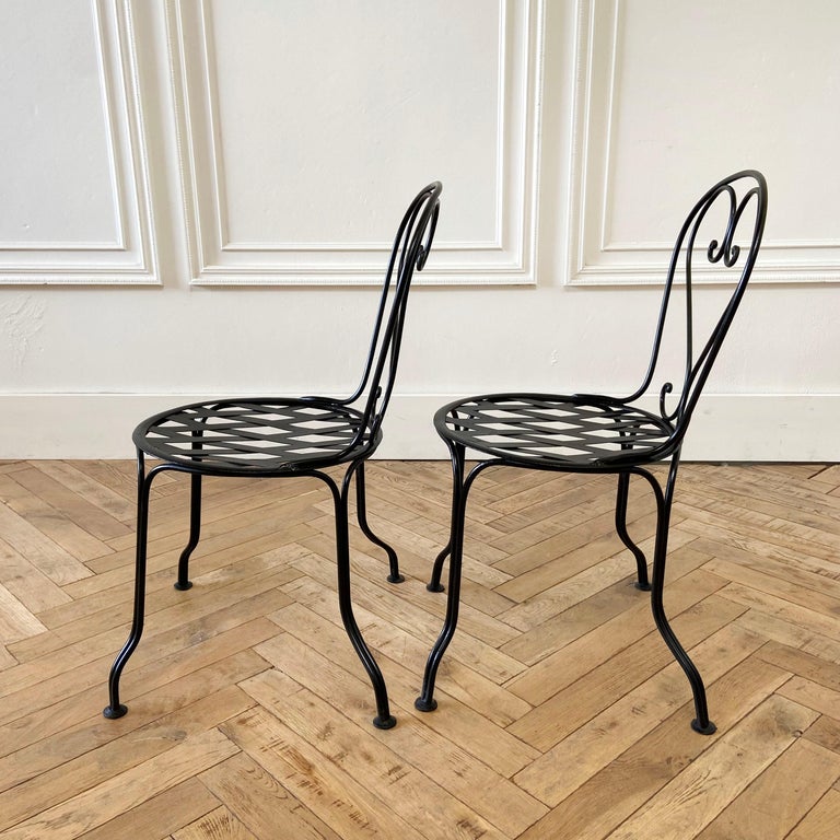 20th Century Vintage Pair of French Style Black Iron Bistro Chairs For Sale