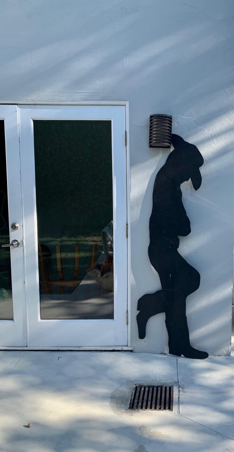 Whimsical pair of wood silhouettes in the shape of a man and woman. Both life-sized. Both wearing cowboy hats. Great for a bar or placed outside against a wall. Good vintage condition. Priced as a pair.

Male dimensions .05