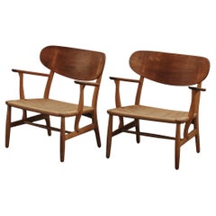 Vintage Pair Of Hans Wegner CH22 Lounge Chairs From Denmark, Circa 1960