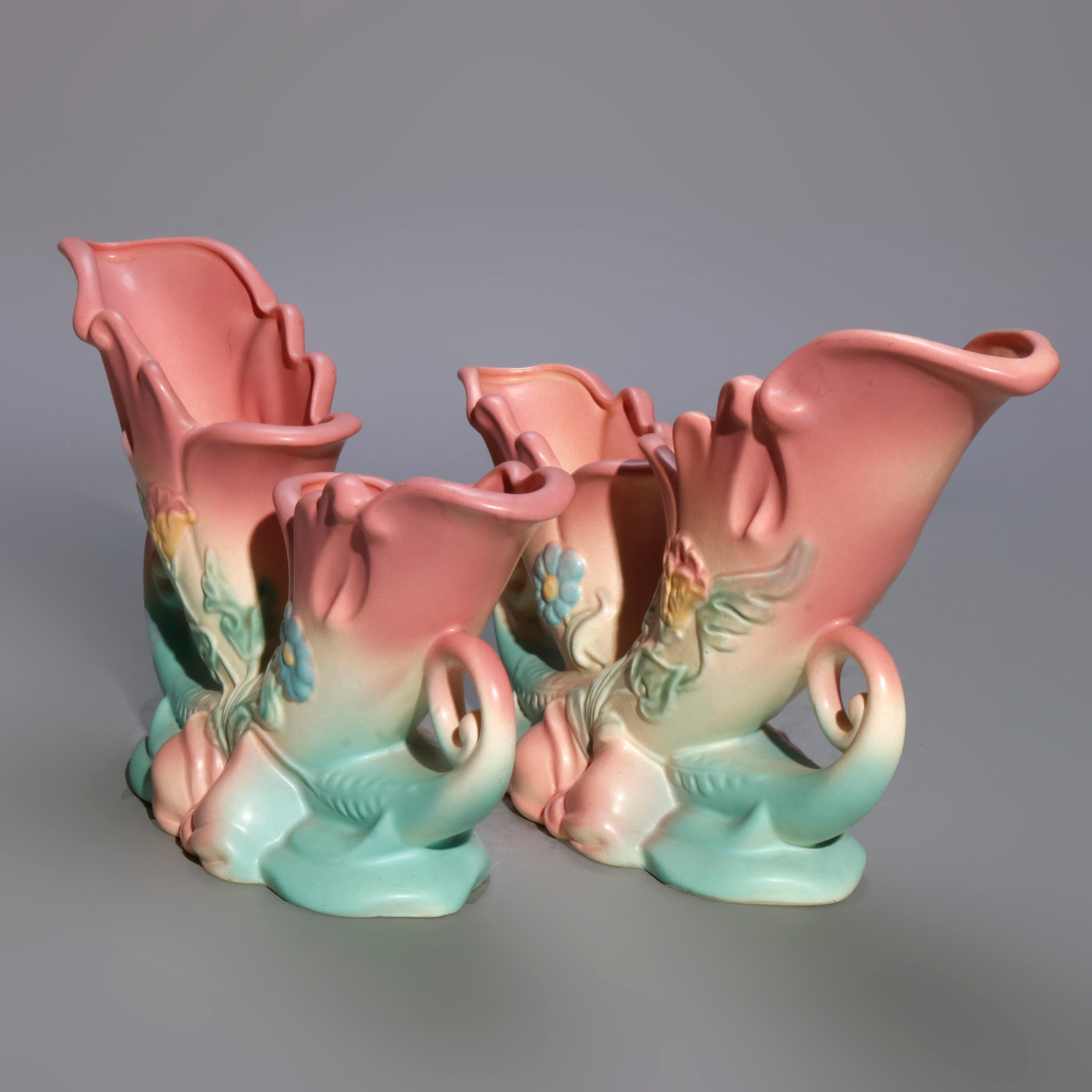 Vintage pair of Hull art pottery vases offer Cornucopia form with floral and bow decoration, marked on bases as photographed, circa 1940.

Measures: 7.5