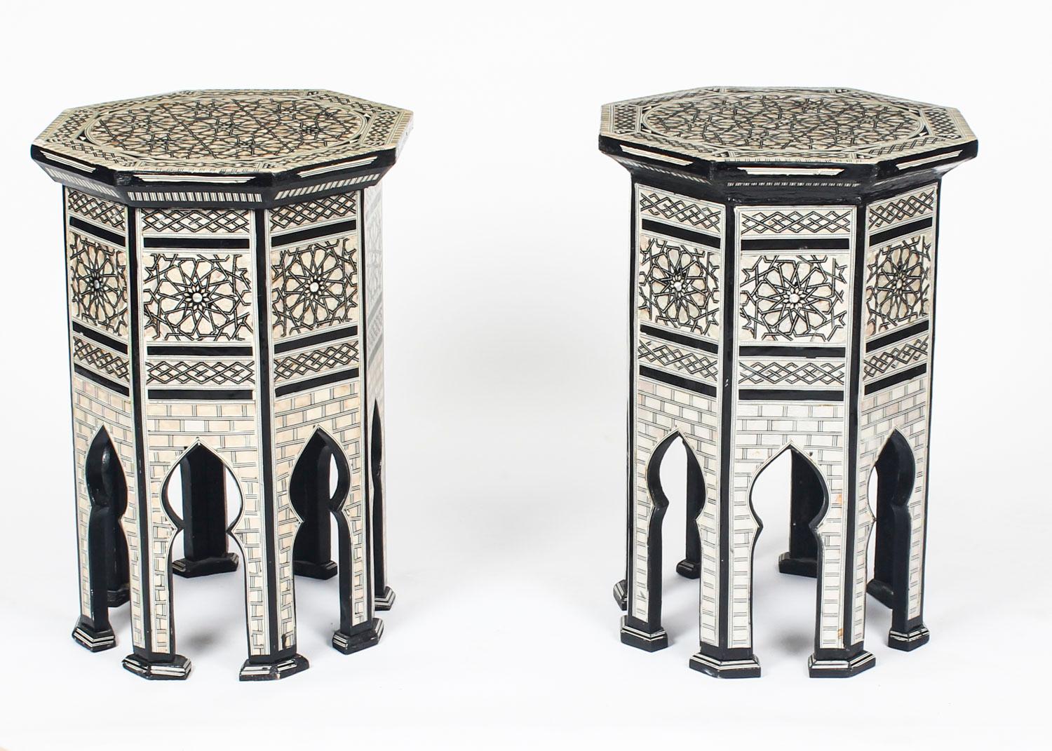 This is a superb intricately inlaid pair of side tables decorated with mother of pearl from Damascus and dating from the mid-20th century.

The octagonally shaped tables featurs beautifully detailed inlaid mother of pearl parquetry in interlocking