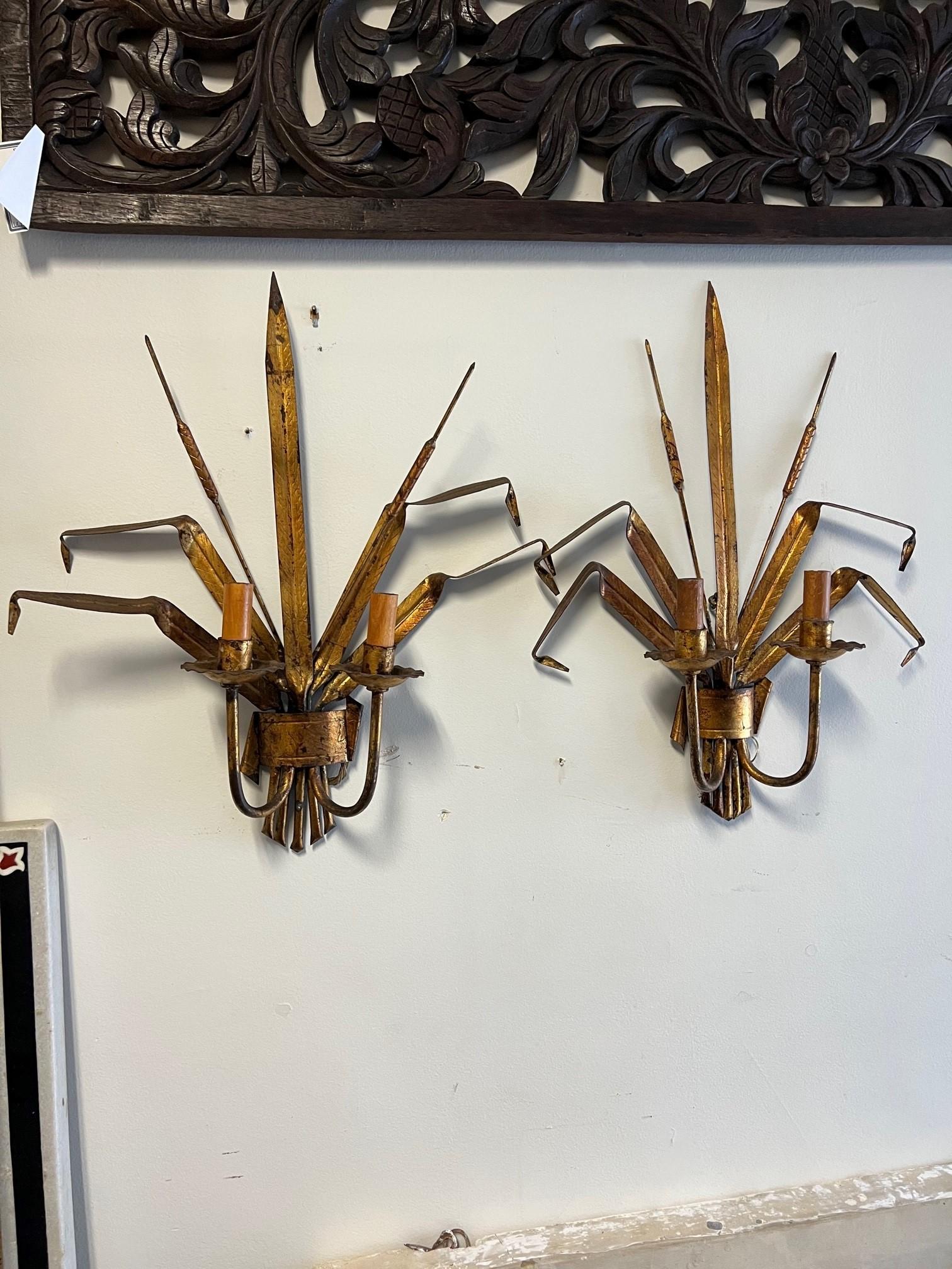 A great pair of vintage gilt metal sconces from Italy with cattails and grass in a antique gold finish. According to Victorian tradition, in the 
