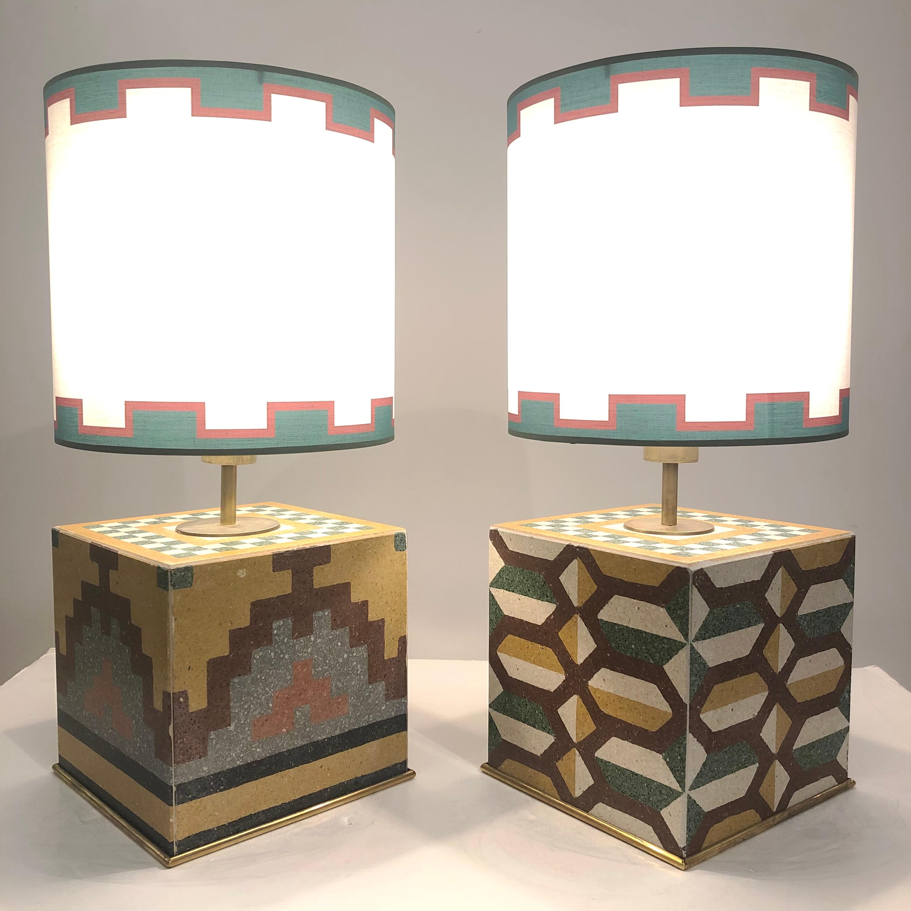 An Italian artistic modern creation, entirely handcrafted, made out of mid 20th-Century cement tiles, with mosaic hand applied unique decor in yellow, brown, ochre, green tints. The ivory shades are customized with a greek border in terracotta brown