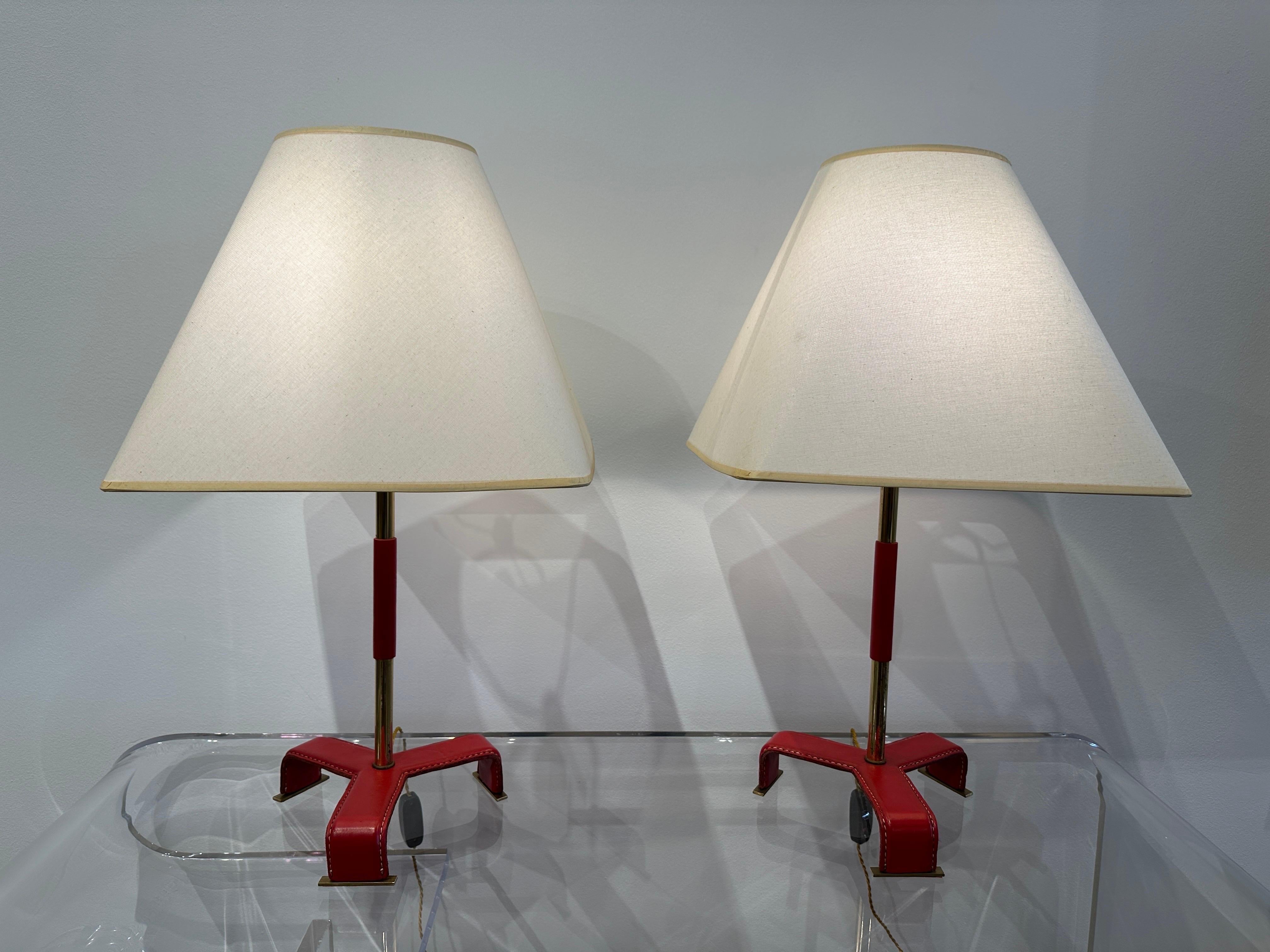 French Vintage Pair of Jacques Adnet style Red Stitched Leather Table Lamps, 1950's For Sale