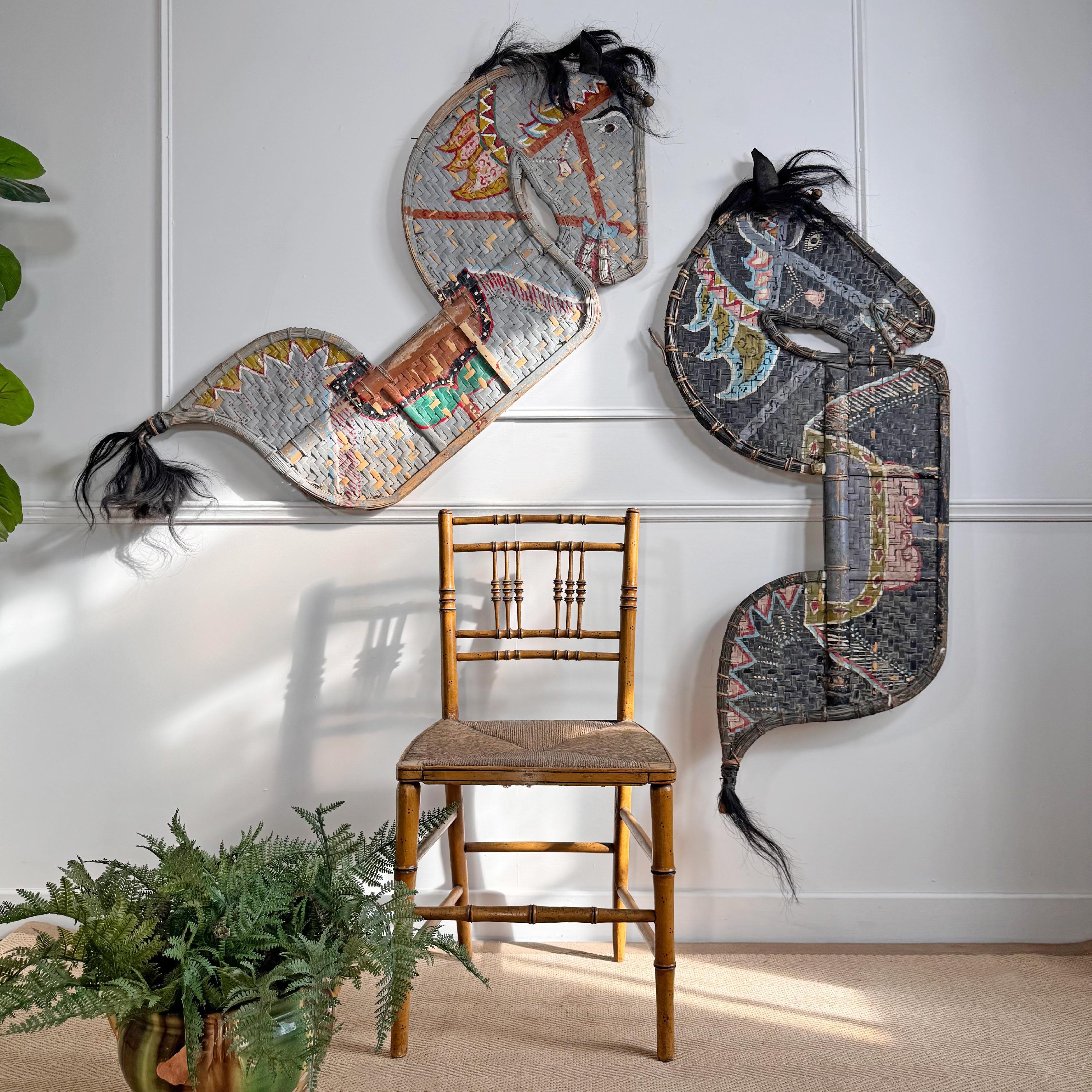 A stunning and ornate pair of circa 1950 Kuda Lumping painted ceremonial horses, hand crafted these beautiful horses have been used for over a century in the Javanese Kuda Lumping dances, the dancers perform using rattan horses, generally colourful