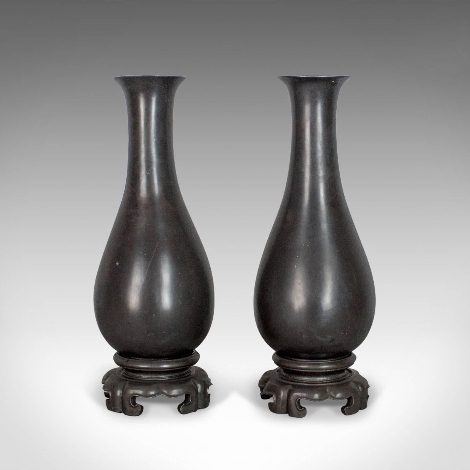 This is a pair of lacquerware vases, Chinese 'bodiless' stem vases hand decorated with silver dragons on a black ground.

A fine pair of lacquerware stem vases
Characteristically lightweight with an attractive lustre
Profusely and expertly hand