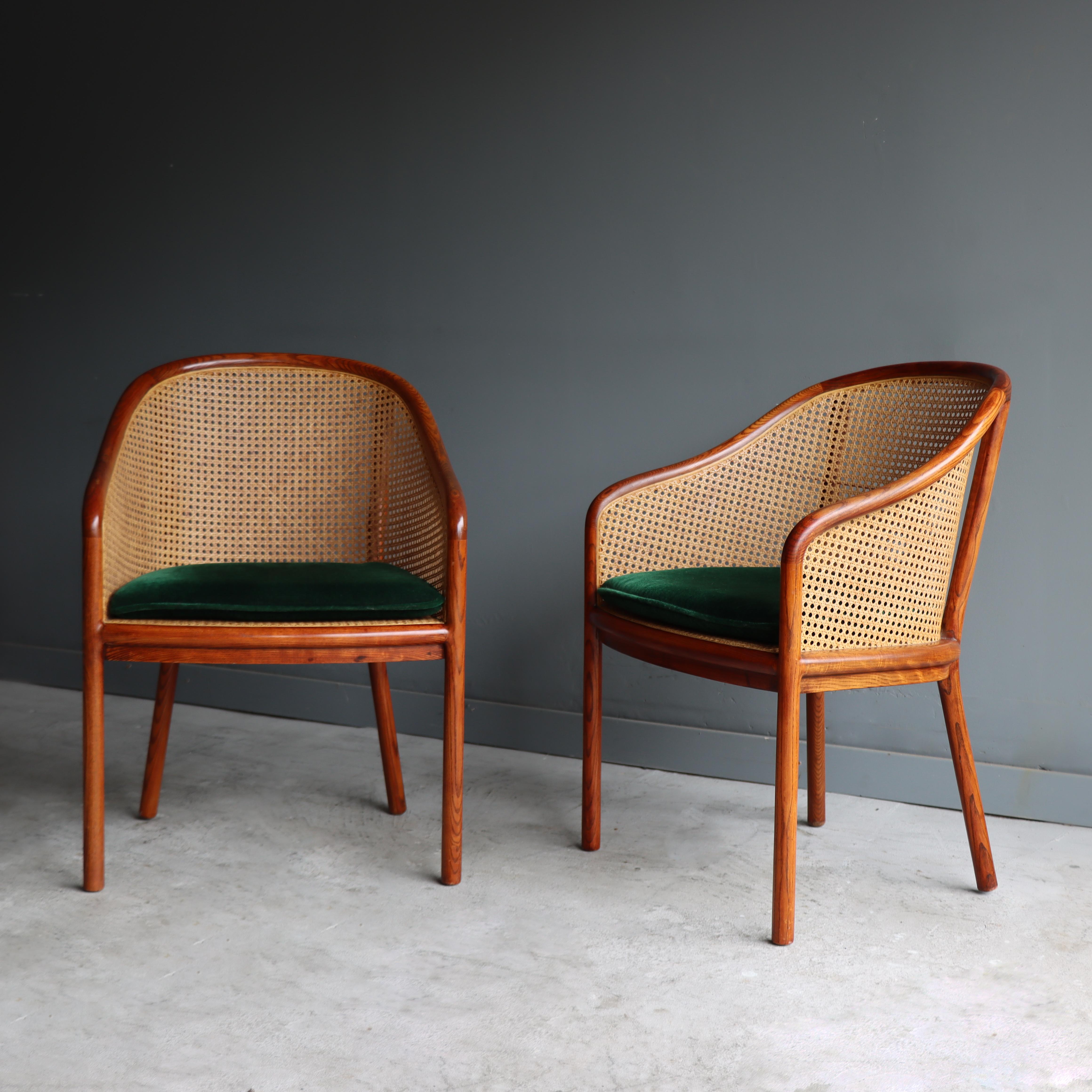 Beautiful vintage pair of cane and ash “Landmark” armchairs designed by Ward Bennett for Brickel - 1970s. A personal favorite, these examples still retain their original green mohair seat cushions. 

Good looking as they are comfortable, the frames