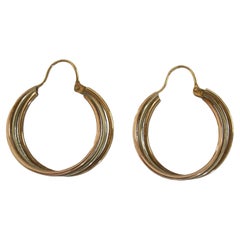 Coppia di grandi orecchini a cerchio in oro tricolore 10 carati - Stati Uniti d
America - Anni 
80 circa