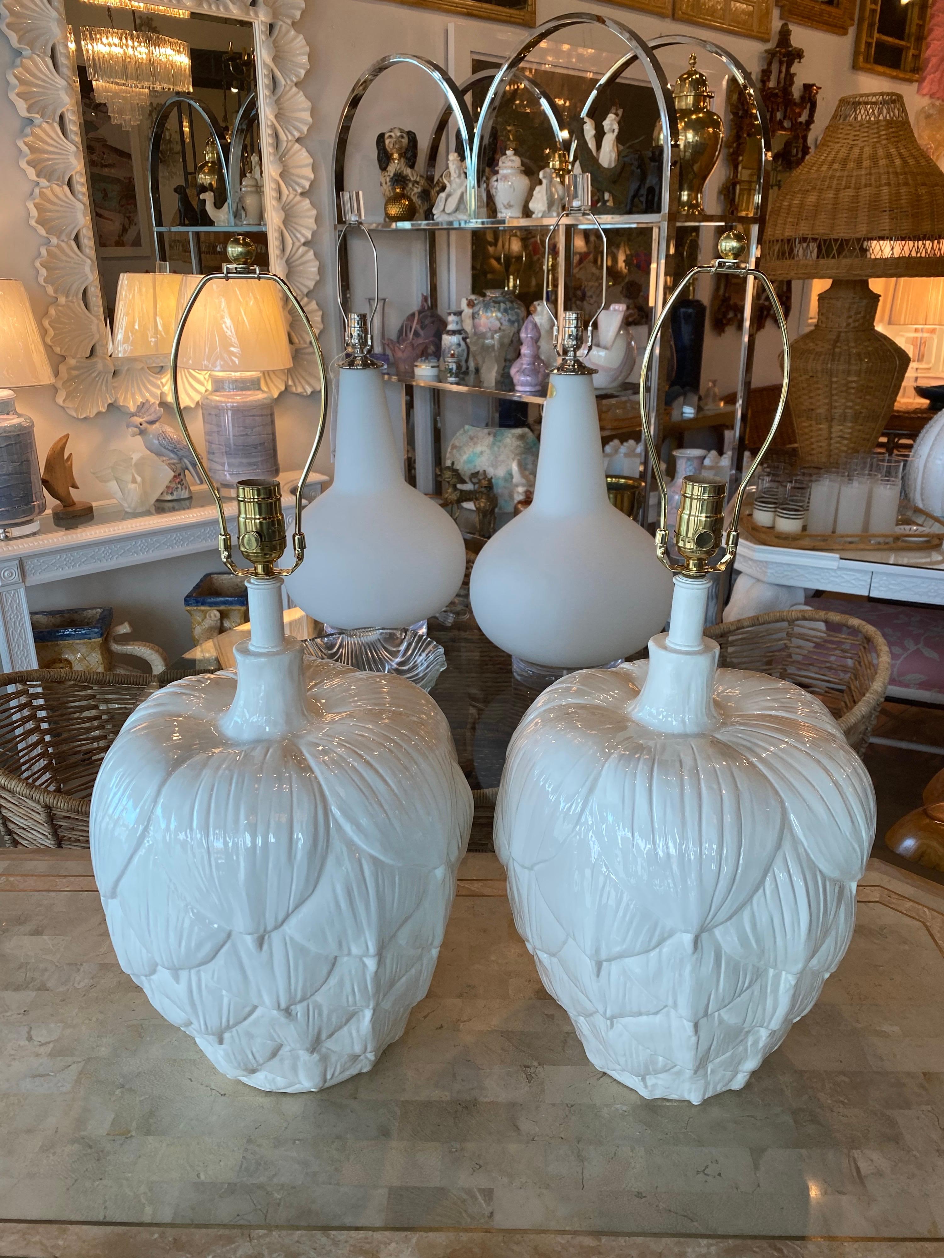 Lovely vintage pair of large ceramic artichoke lamps. These have completely restored. New wiring, 3 way sockets and all brass hardware. No chips or breaks. Dimensions 20