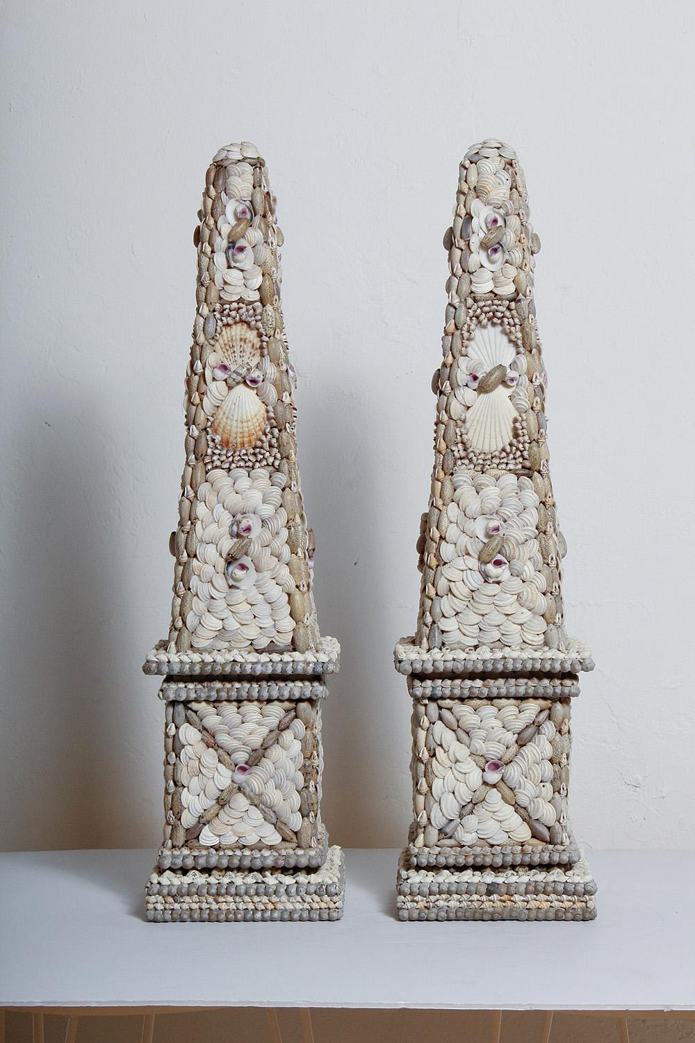 Very fine pair of tall vintage seashell obelisks. Please note that these are a 
